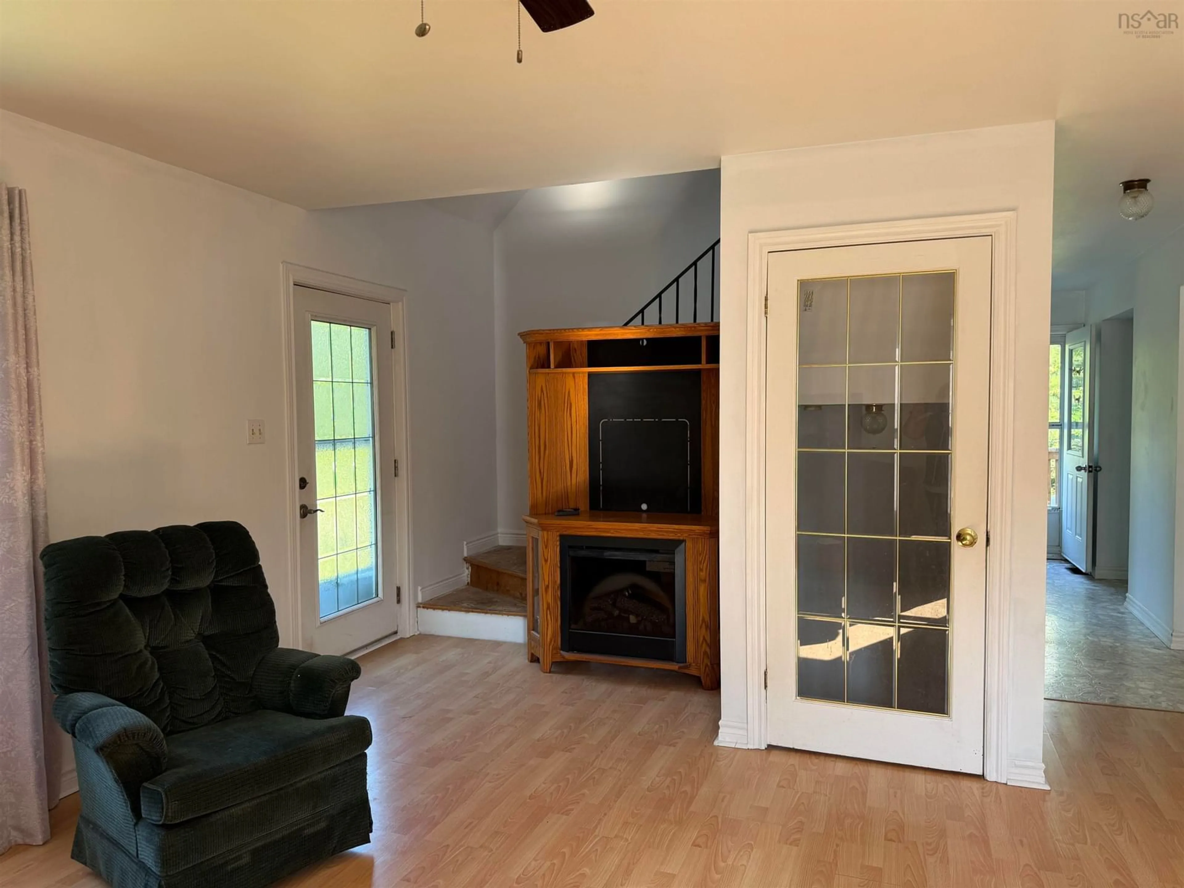 Living room with furniture, wood/laminate floor for 36 Lowden Rd, Linacy Nova Scotia B2H 5C4