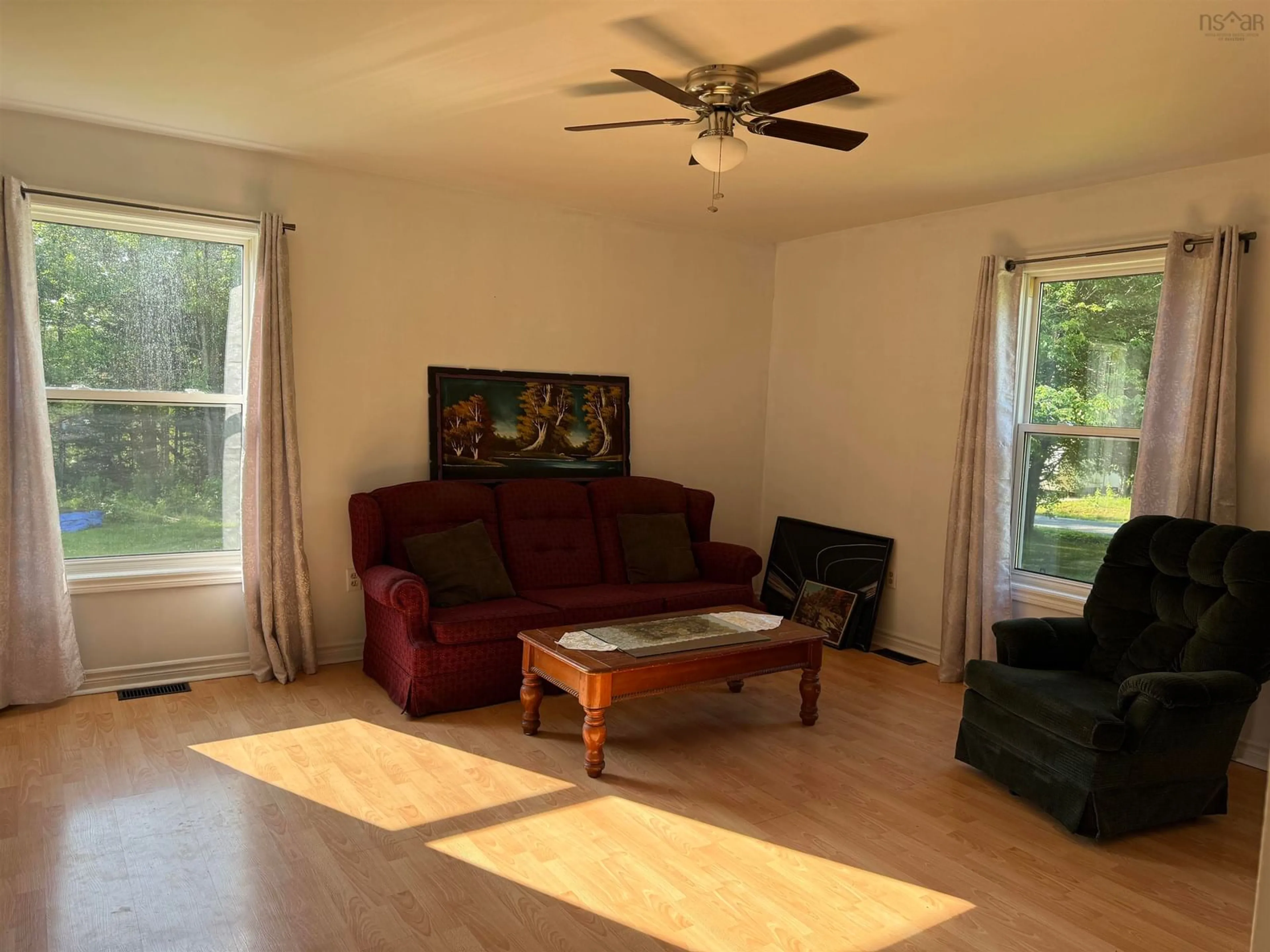 Living room with furniture, wood/laminate floor for 36 Lowden Rd, Linacy Nova Scotia B2H 5C4