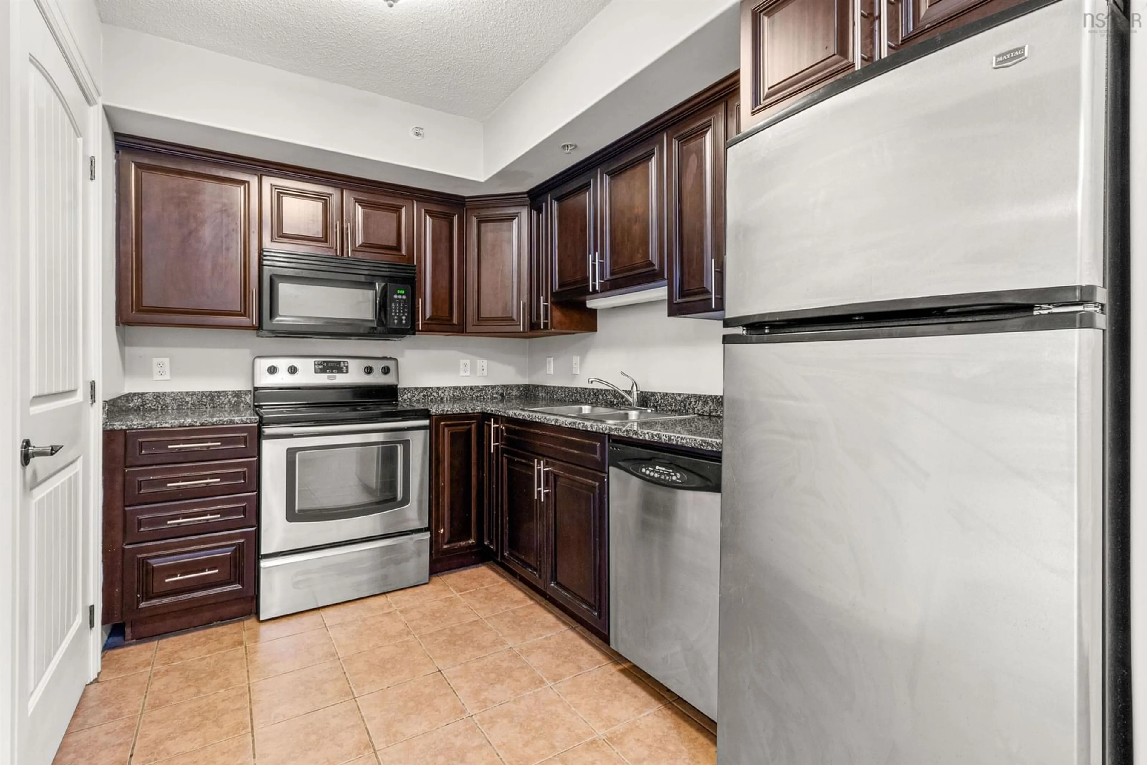 Standard kitchen, ceramic/tile floor for 5505 Falkland St #204, Halifax Nova Scotia B3K 0C3