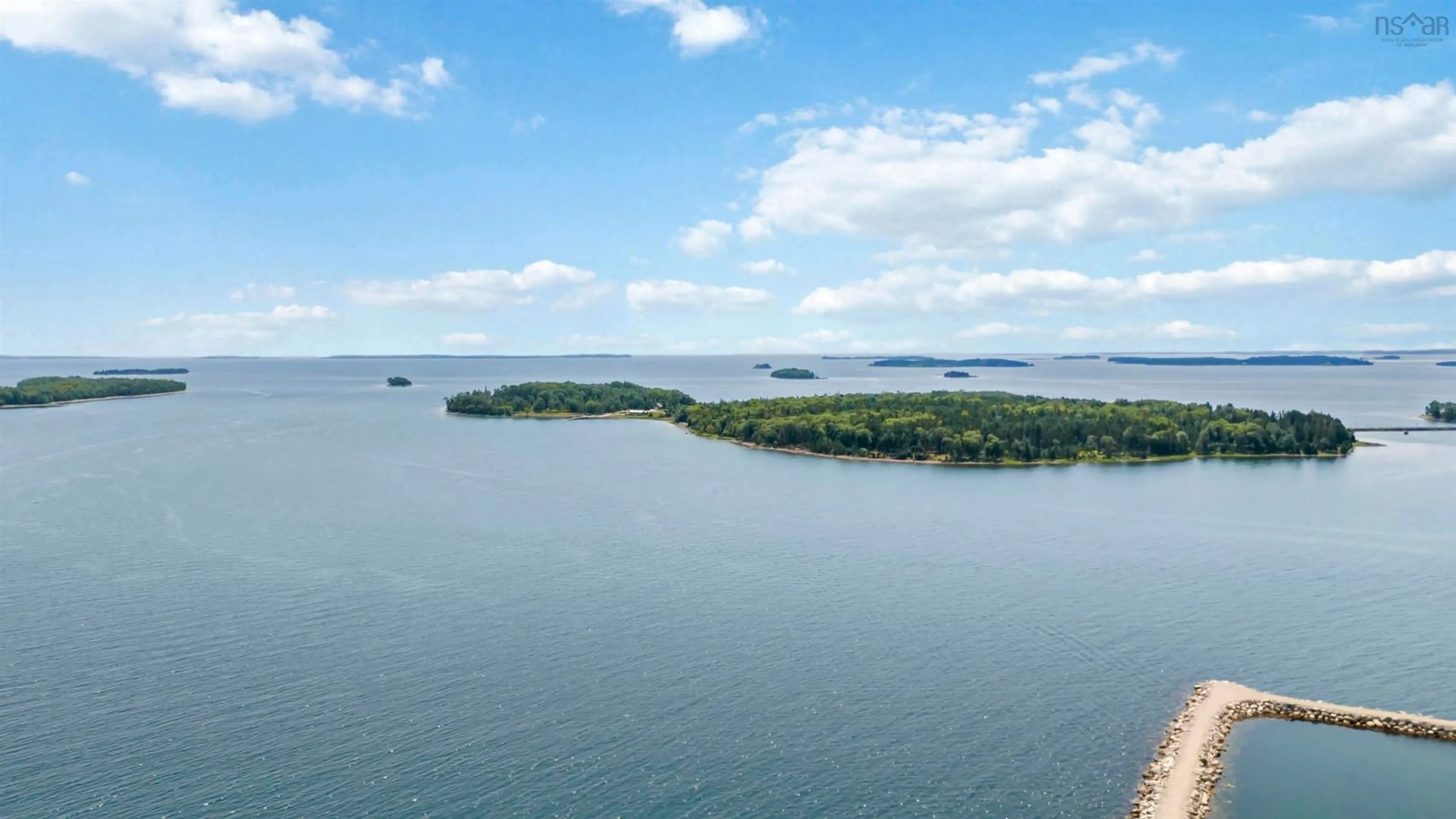 A pic from outside/outdoor area/front of a property/back of a property/a pic from drone, water/lake/river/ocean view for 9 Lavista Dr #Unit 4, Western Shore Nova Scotia B0J 3M0
