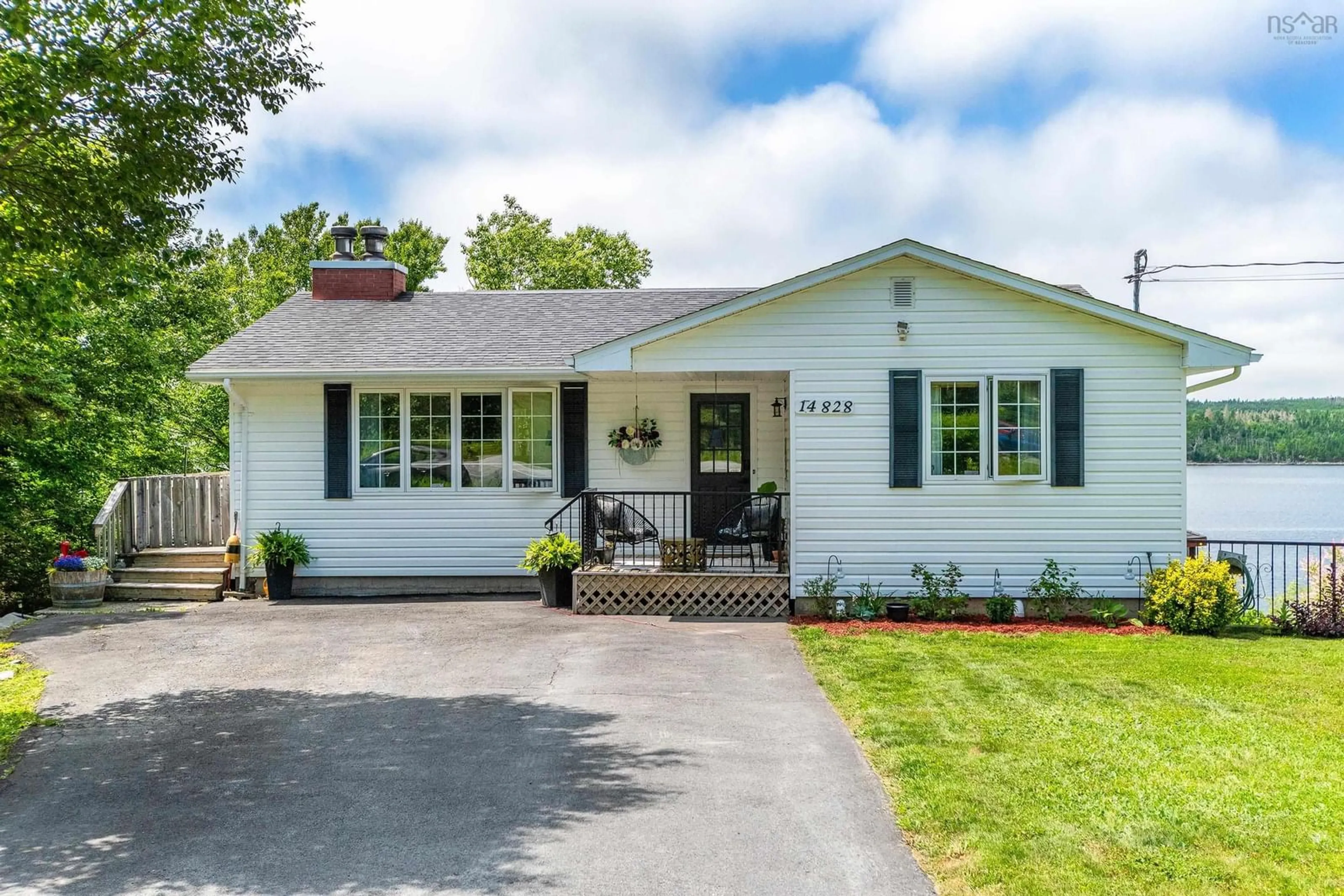Home with vinyl exterior material, street for 14828 Highway 7, East Ship Harbour Nova Scotia B0J 3H0