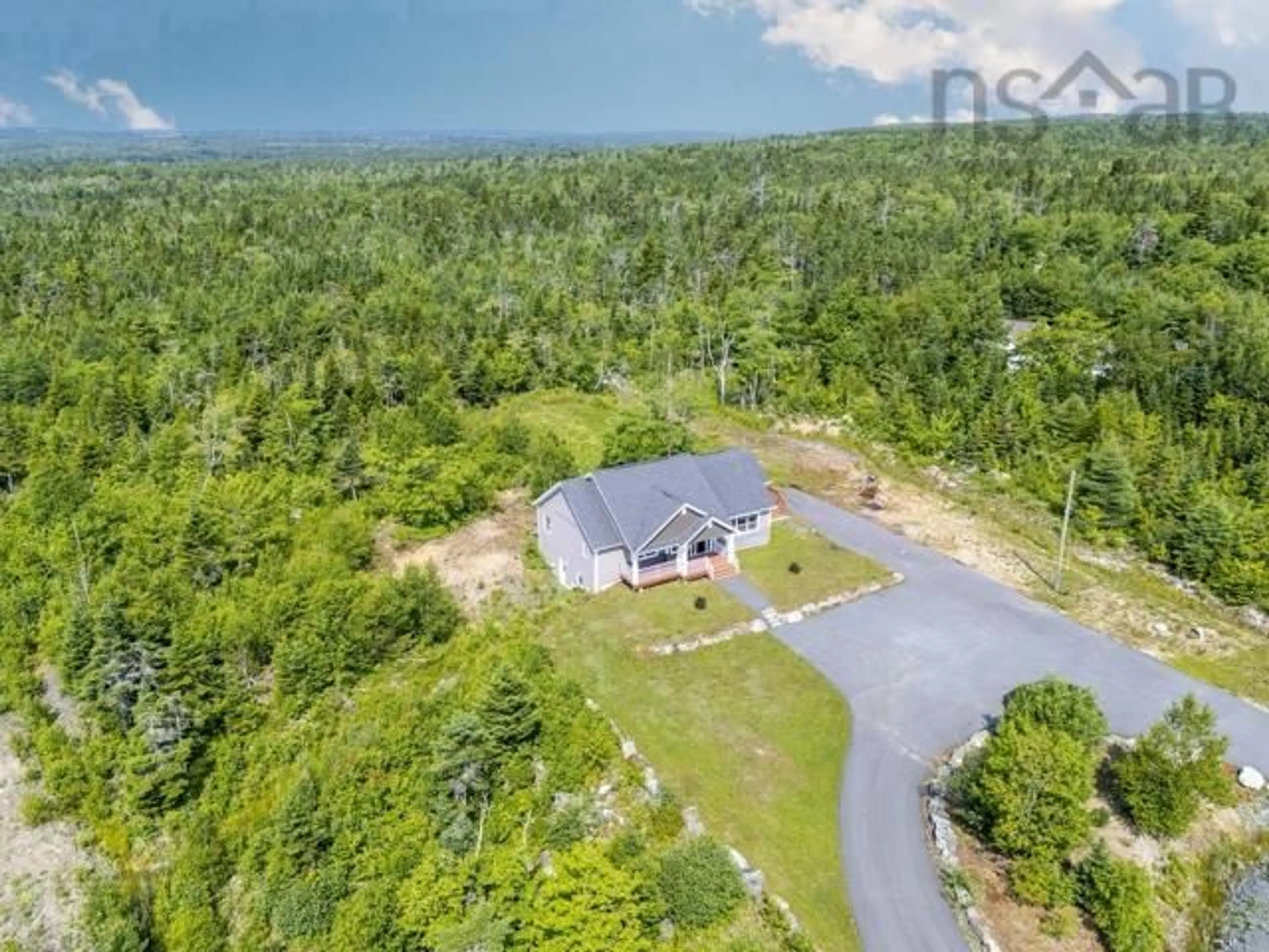 A pic from outside/outdoor area/front of a property/back of a property/a pic from drone, forest/trees view for 210 Keltic Dr, Lawrencetown Nova Scotia B2Z 1M5