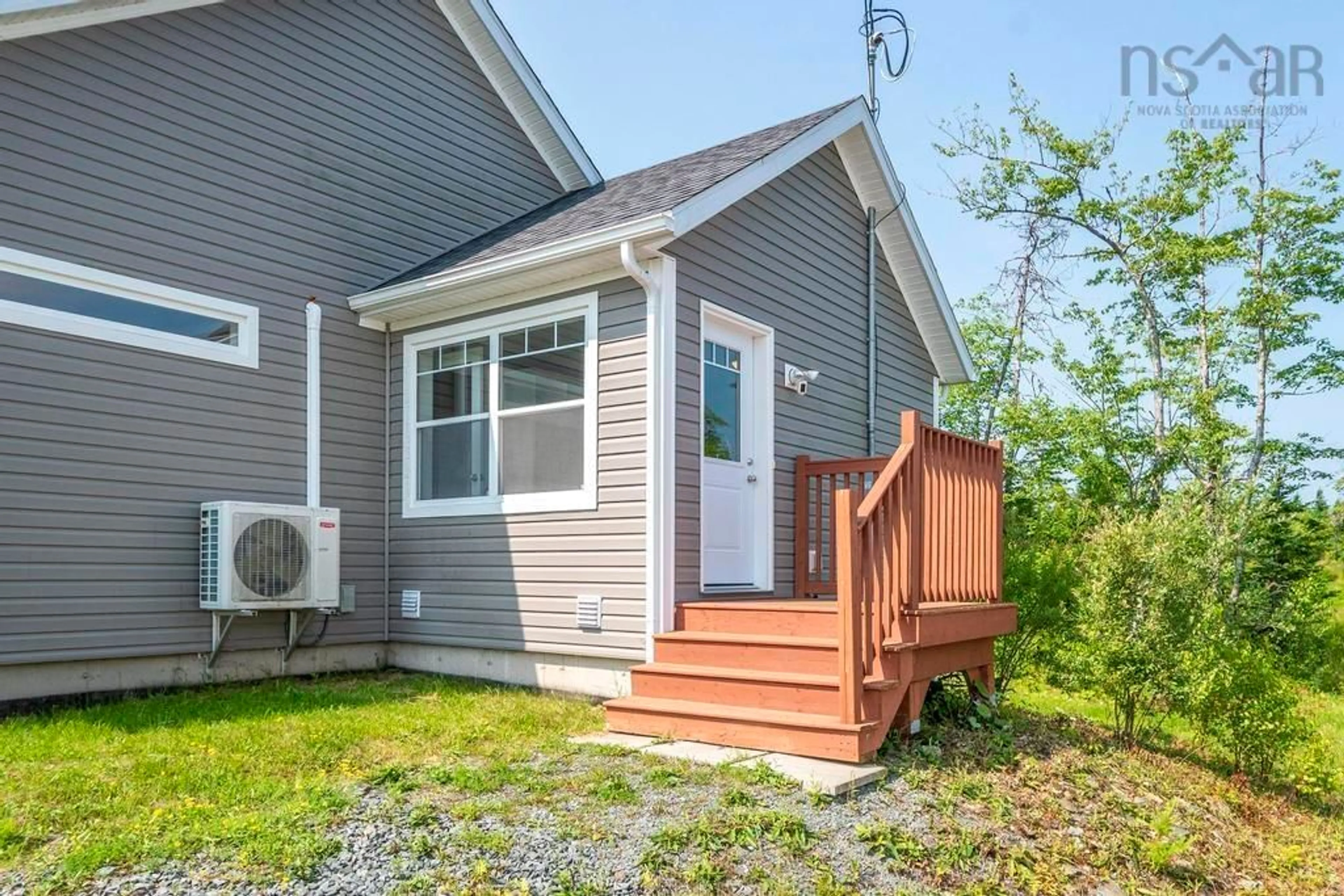 Home with vinyl exterior material, street for 210 Keltic Dr, Lawrencetown Nova Scotia B2Z 1M5