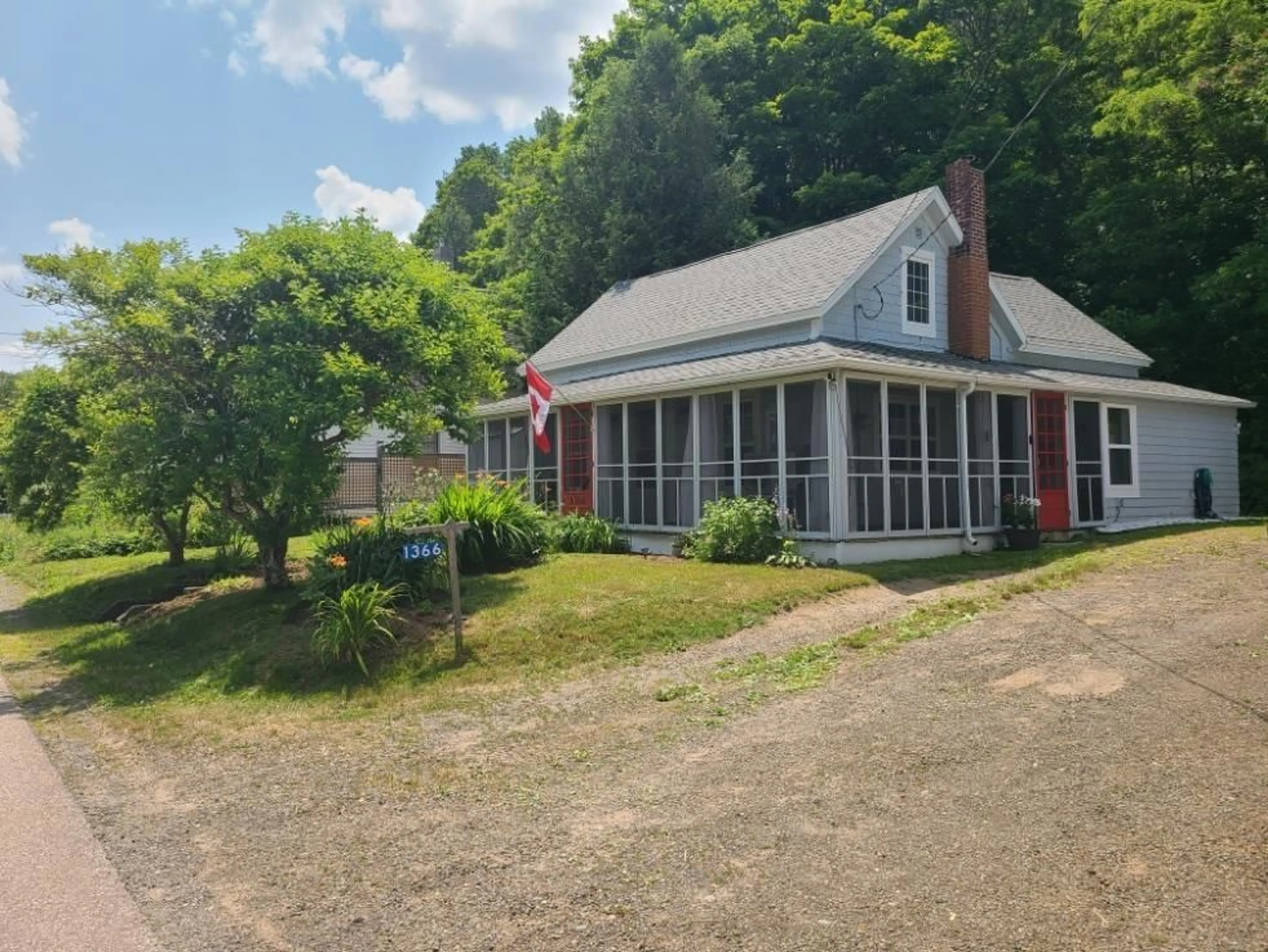 A pic from outside/outdoor area/front of a property/back of a property/a pic from drone, unknown for 1366 River Road, Bear River Nova Scotia B0S 1B0