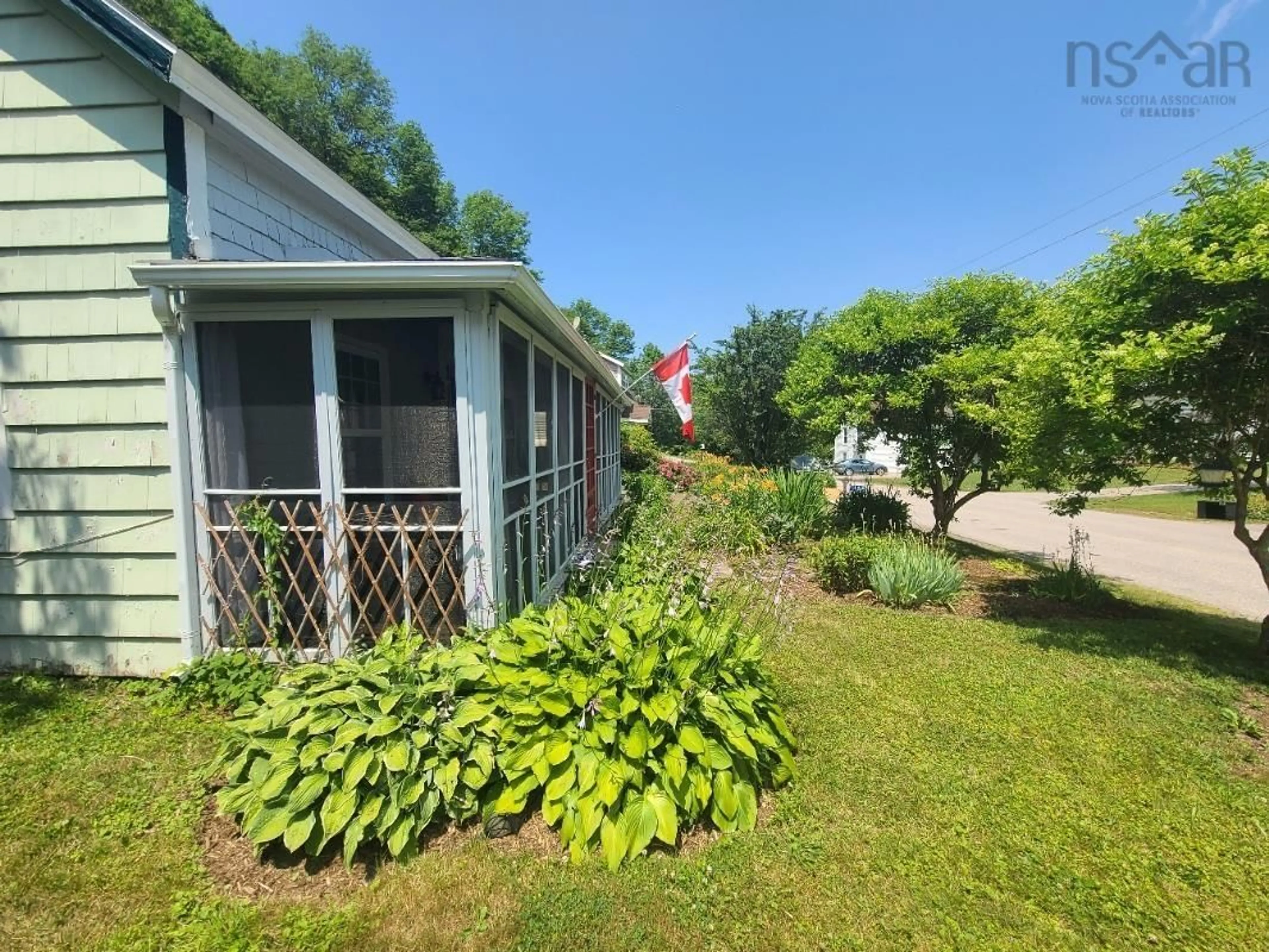 A pic from outside/outdoor area/front of a property/back of a property/a pic from drone, unknown for 1366 River Road, Bear River Nova Scotia B0S 1B0