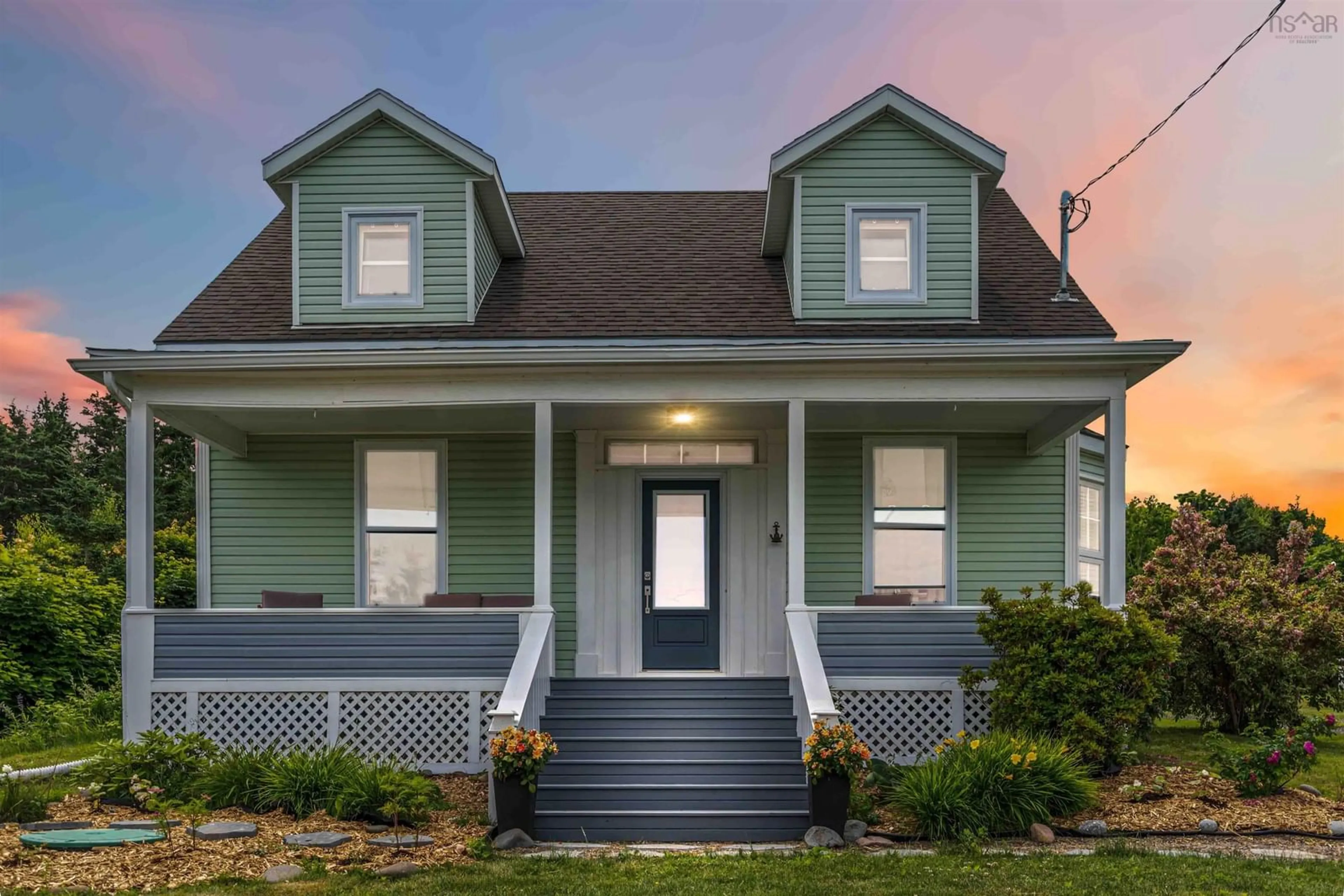 Home with vinyl exterior material, street for 22 Seaman St, Margaretsville Nova Scotia B0S 1N0