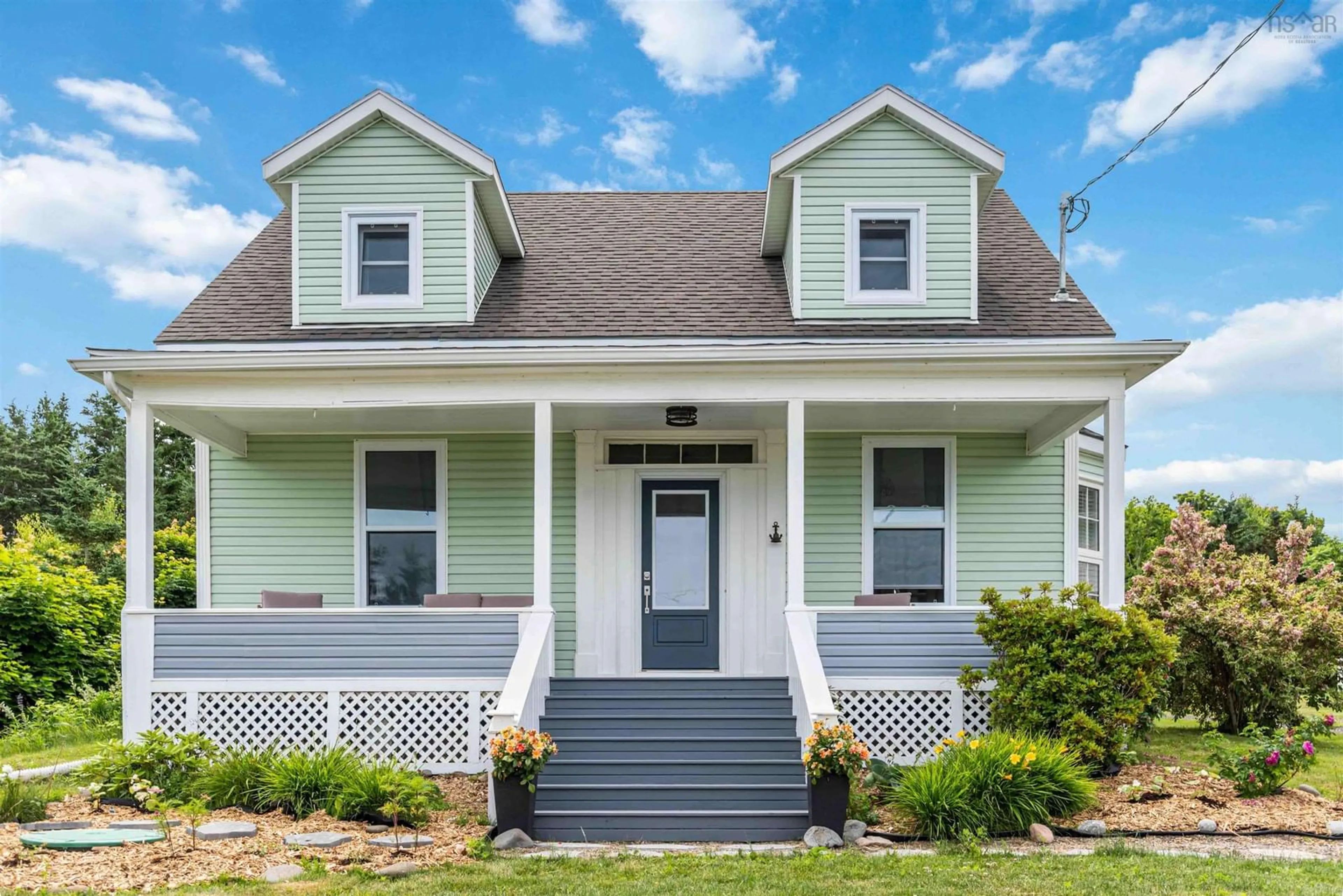 Home with vinyl exterior material, street for 22 Seaman St, Margaretsville Nova Scotia B0S 1N0
