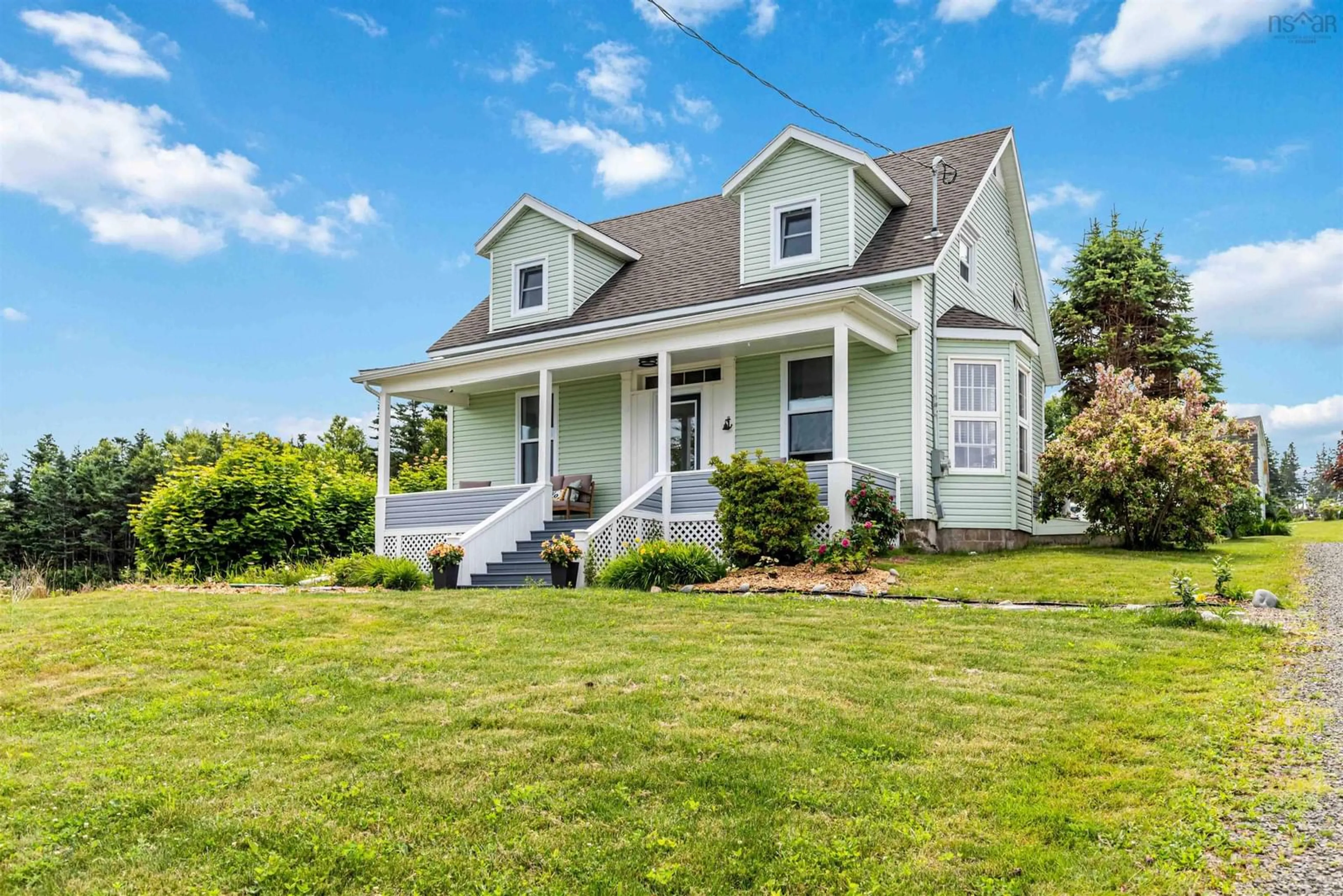 Home with vinyl exterior material, street for 22 Seaman St, Margaretsville Nova Scotia B0S 1N0