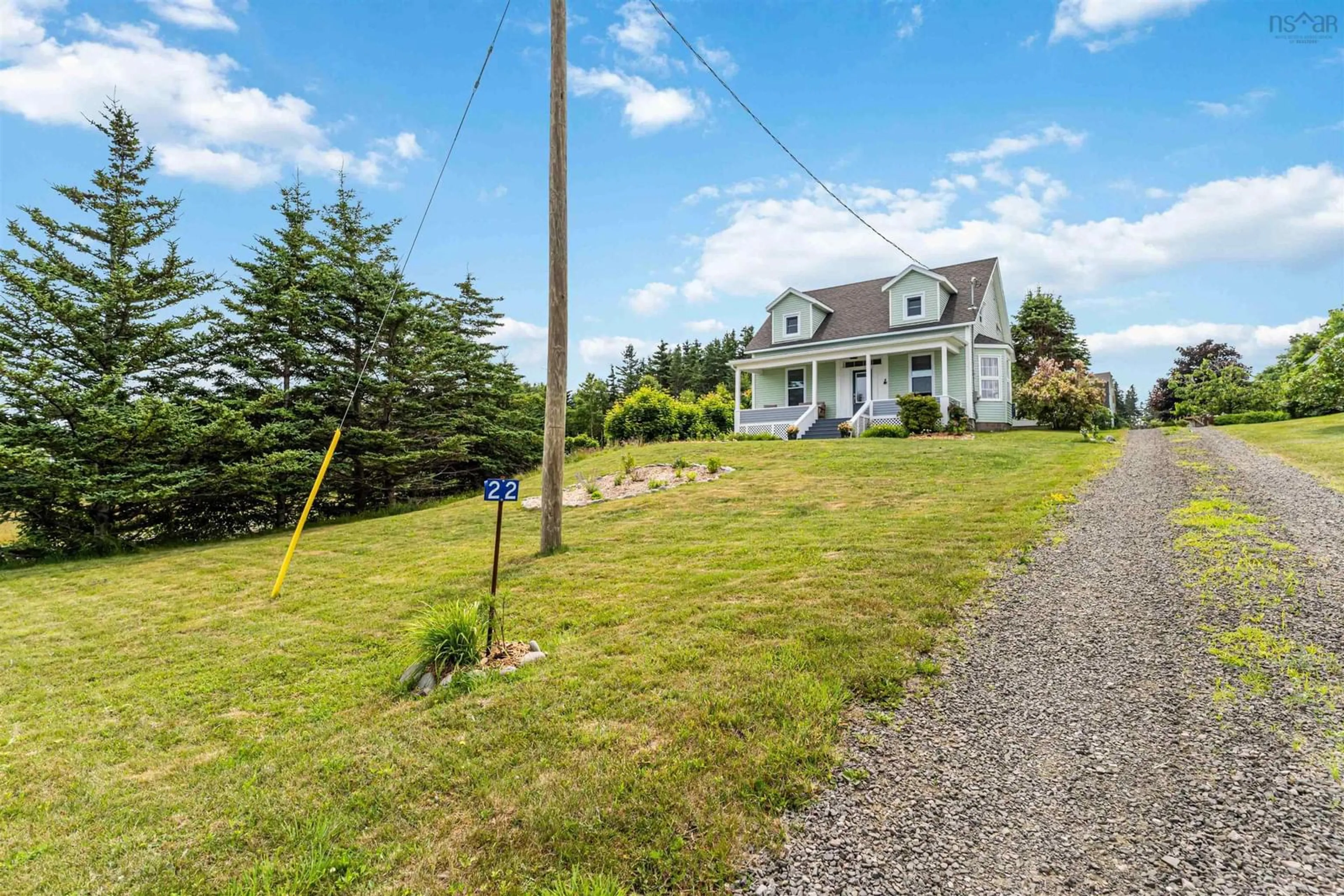 A pic from outside/outdoor area/front of a property/back of a property/a pic from drone, street for 22 Seaman St, Margaretsville Nova Scotia B0S 1N0