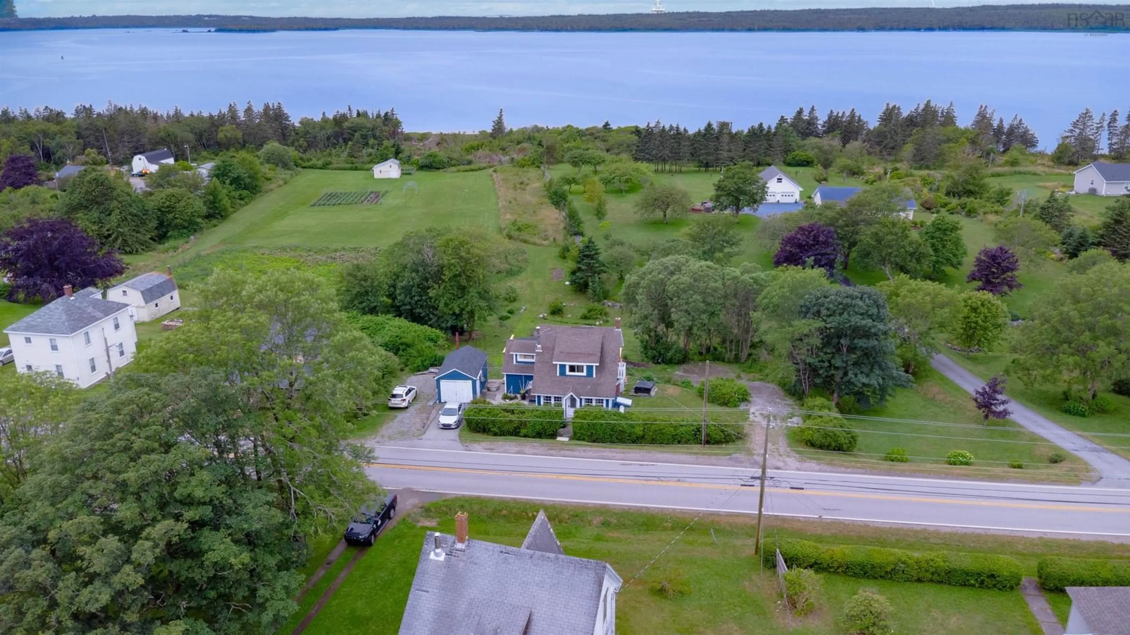 A pic from outside/outdoor area/front of a property/back of a property/a pic from drone, water/lake/river/ocean view for 3150 Highway 334, Lower Wedgeport Nova Scotia B0W 2B0