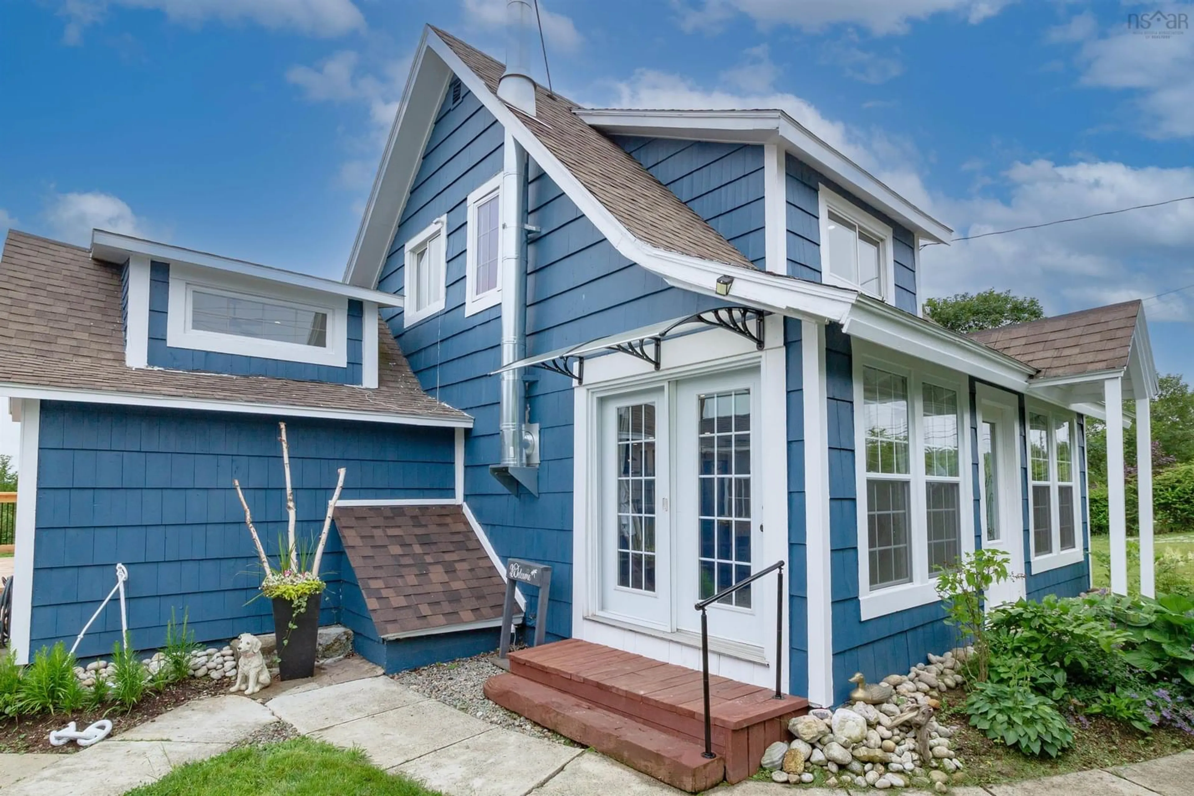 Home with vinyl exterior material, street for 3150 Highway 334, Lower Wedgeport Nova Scotia B0W 2B0