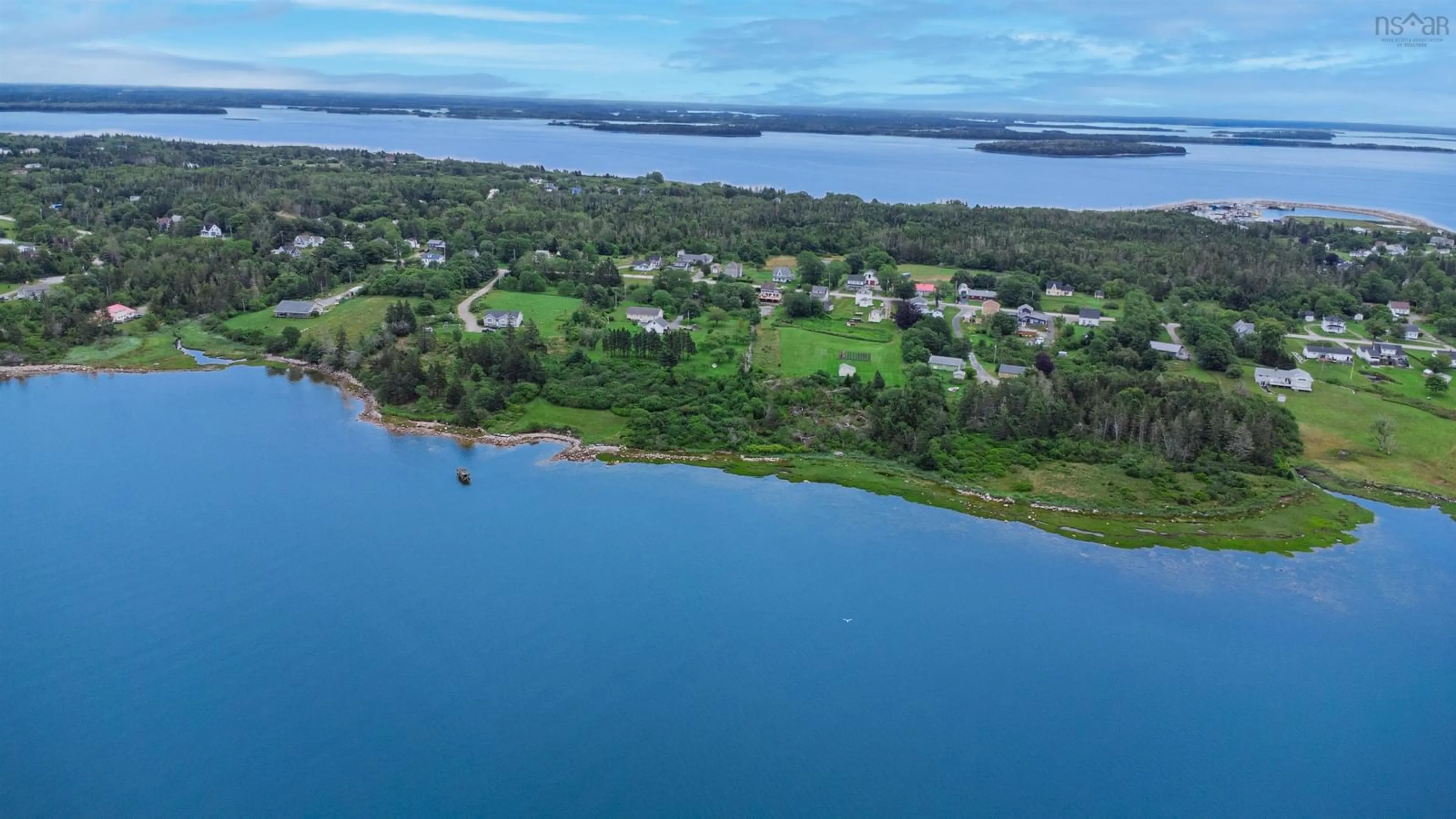 A pic from outside/outdoor area/front of a property/back of a property/a pic from drone, water/lake/river/ocean view for 3150 Highway 334, Lower Wedgeport Nova Scotia B0W 2B0