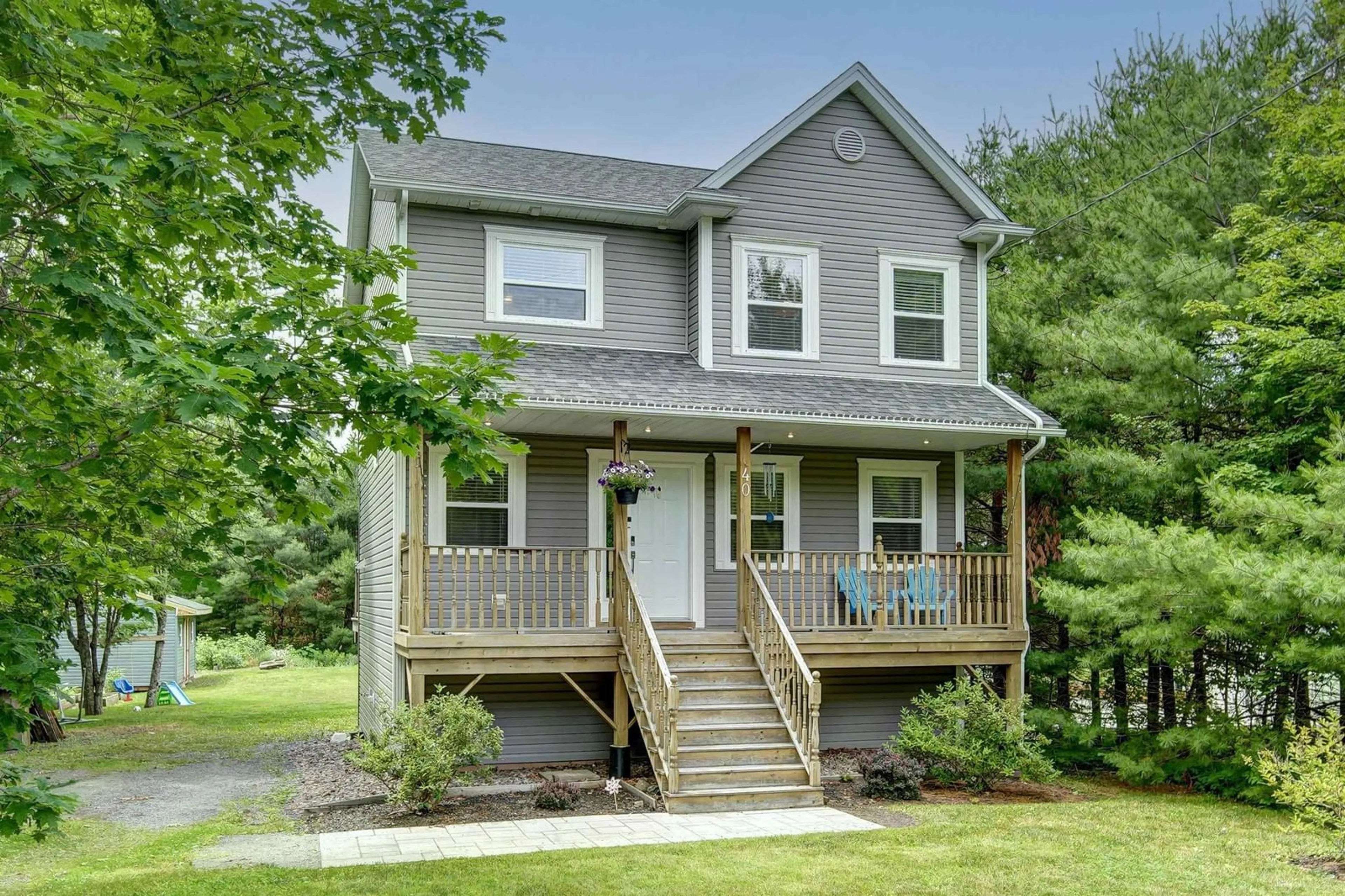 Home with vinyl exterior material, street for 40 Caribou Rd, Upper Sackville Nova Scotia B4E 3C1