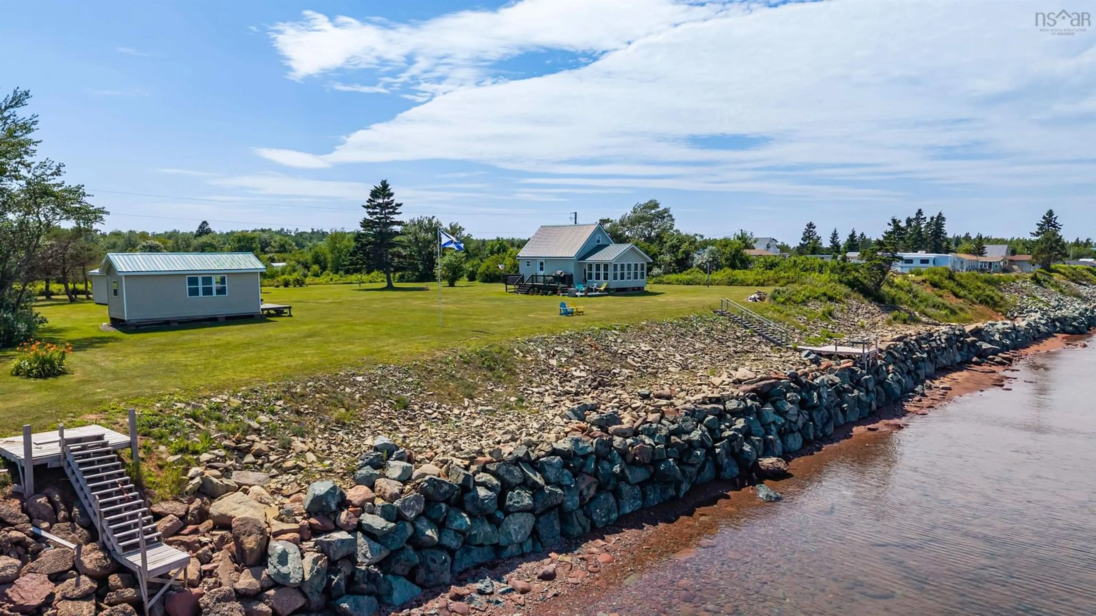 A pic from outside/outdoor area/front of a property/back of a property/a pic from drone, water/lake/river/ocean view for 1 Wild Rose Lane, Port Howe Nova Scotia B0K 1K0