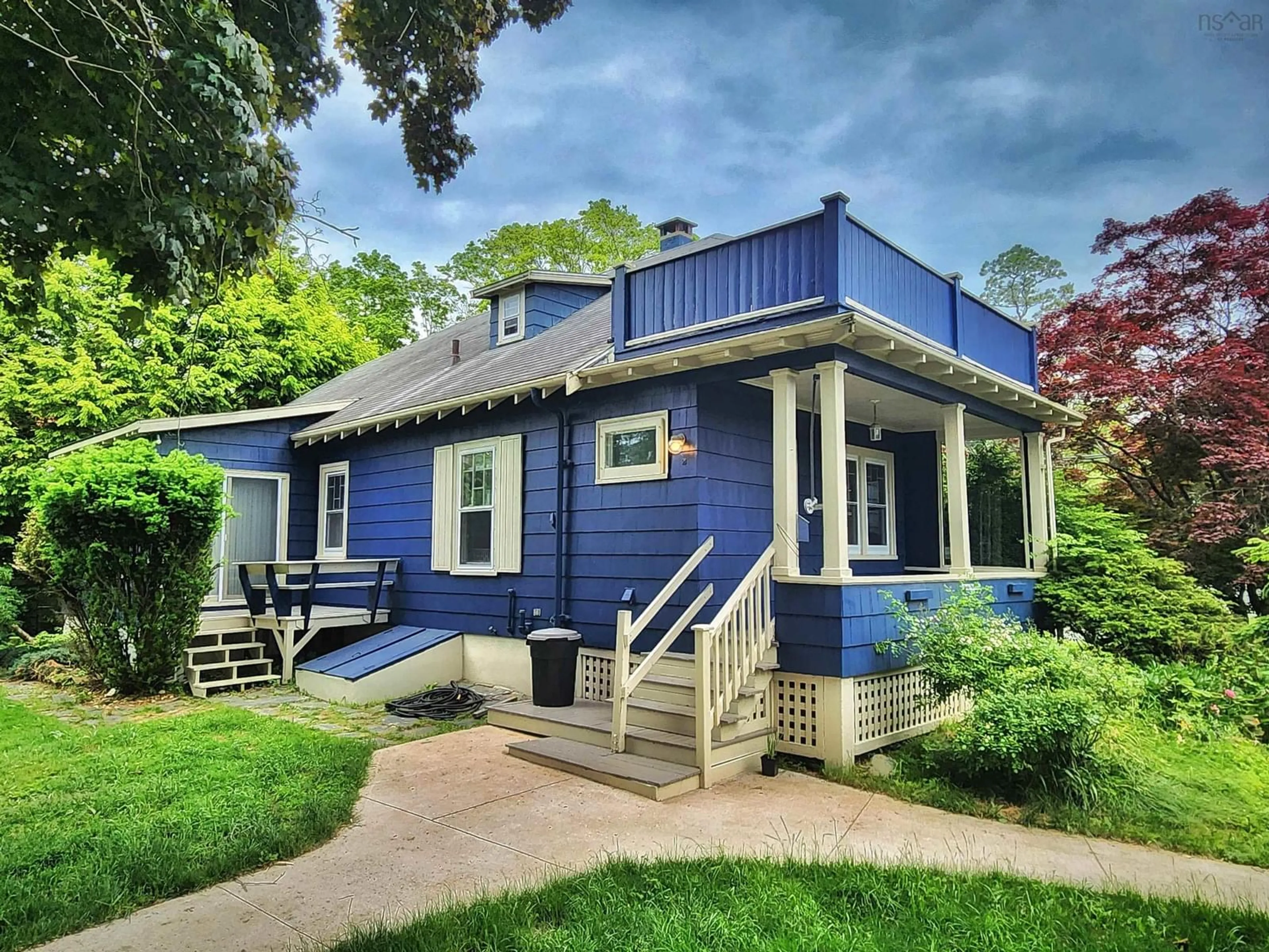 Home with vinyl exterior material, street for 70 Victoria Rd, Lunenburg Nova Scotia B0J 2C0