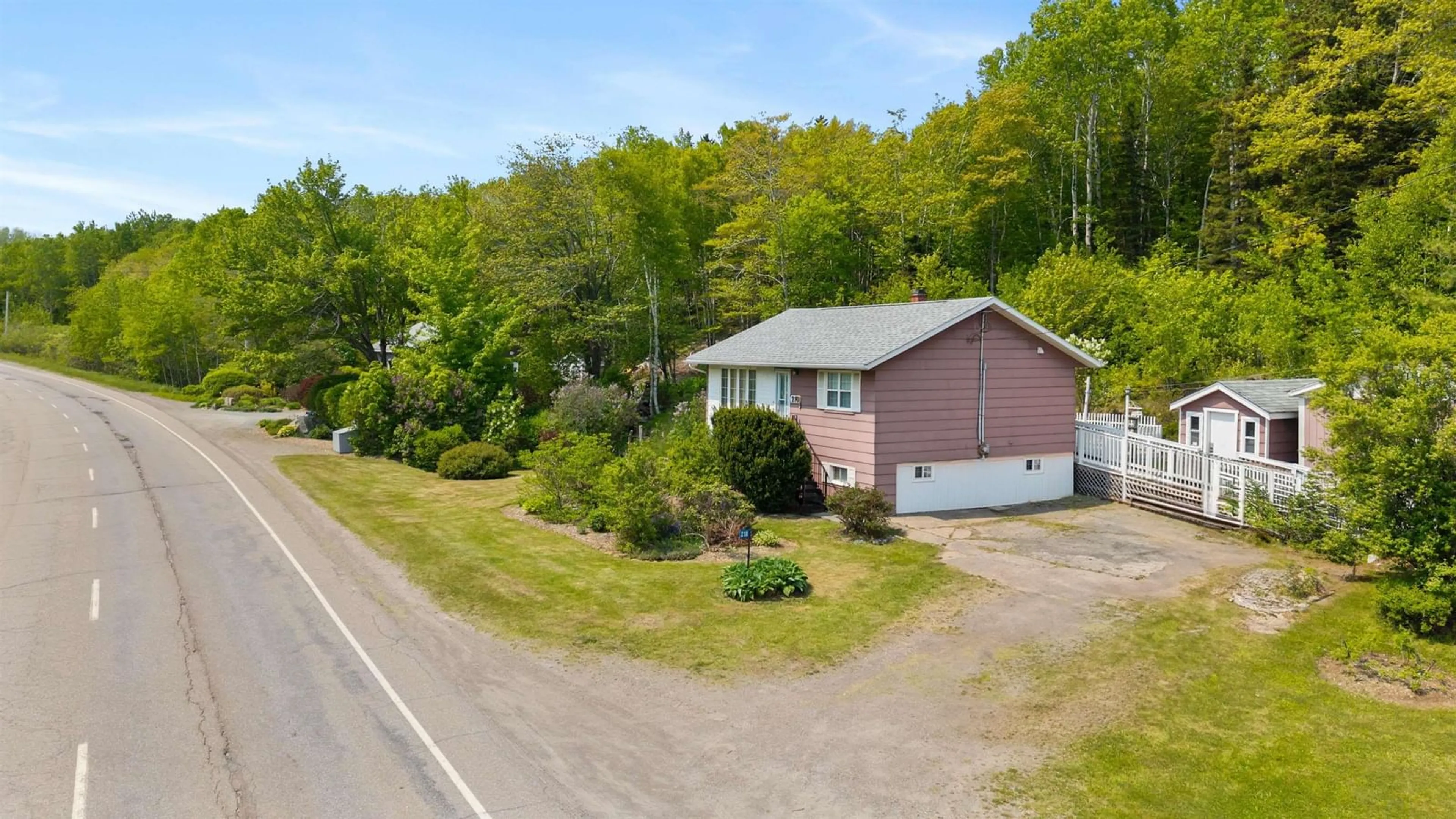 A pic from outside/outdoor area/front of a property/back of a property/a pic from drone, unknown for 210 Main St, Mulgrave Nova Scotia B0E 2G0