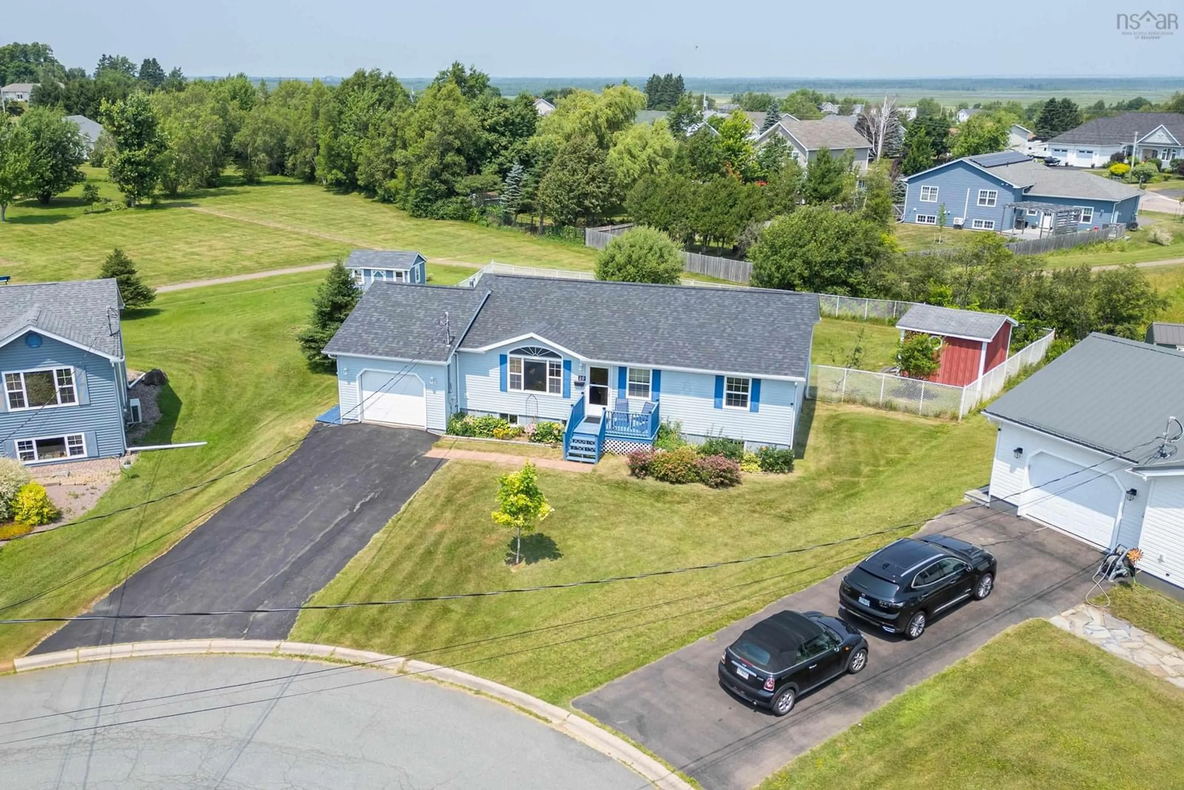 A pic from outside/outdoor area/front of a property/back of a property/a pic from drone, water/lake/river/ocean view for 10 Garden Crt, Amherst Nova Scotia B4H 4R8