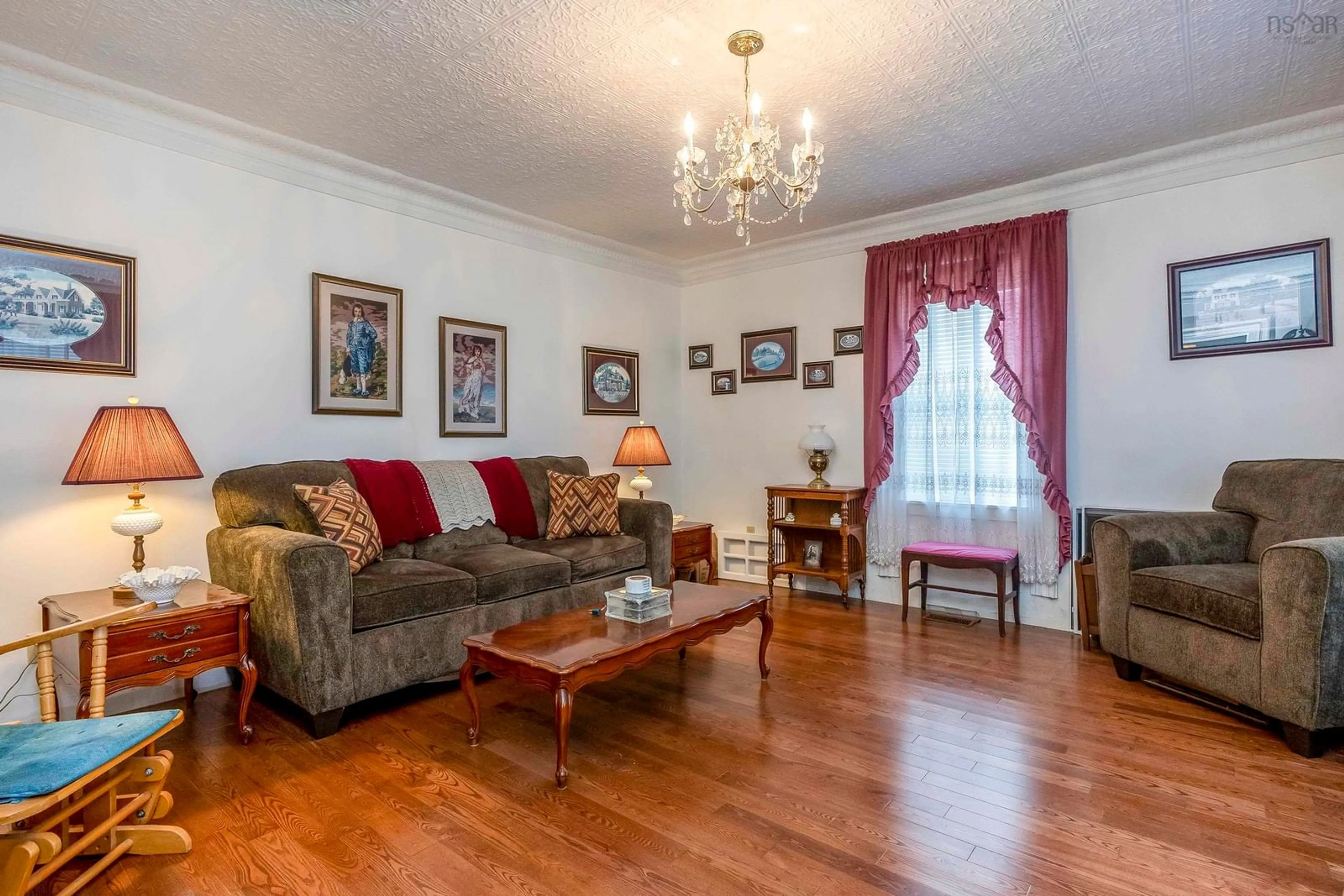Living room with furniture, wood/laminate floor for 5454 Granville Rd, Granville Ferry Nova Scotia B0S 1A0
