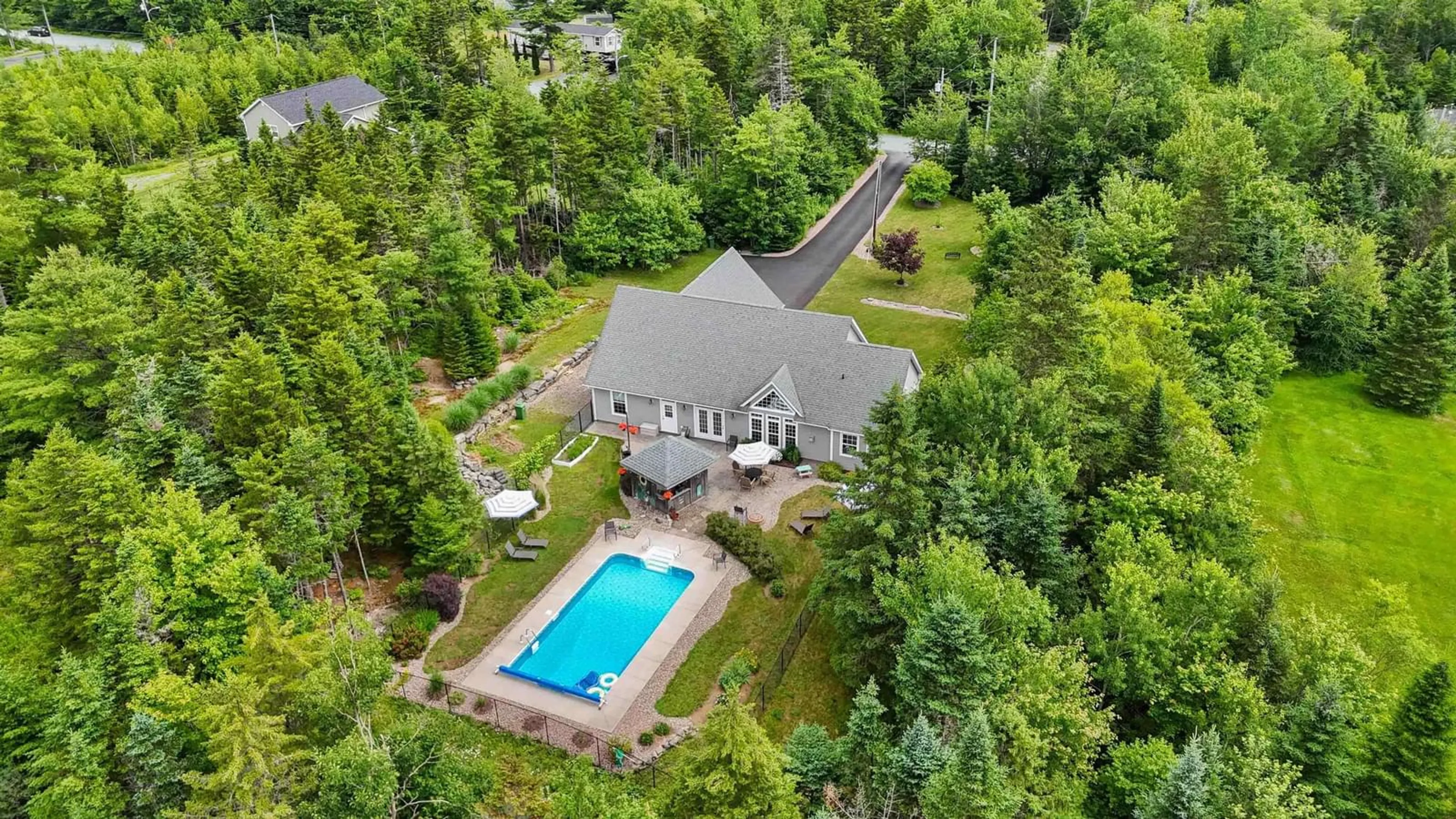 A pic from outside/outdoor area/front of a property/back of a property/a pic from drone, water/lake/river/ocean view for 144 Patton Rd, Upper Sackville Nova Scotia B4E 3B9