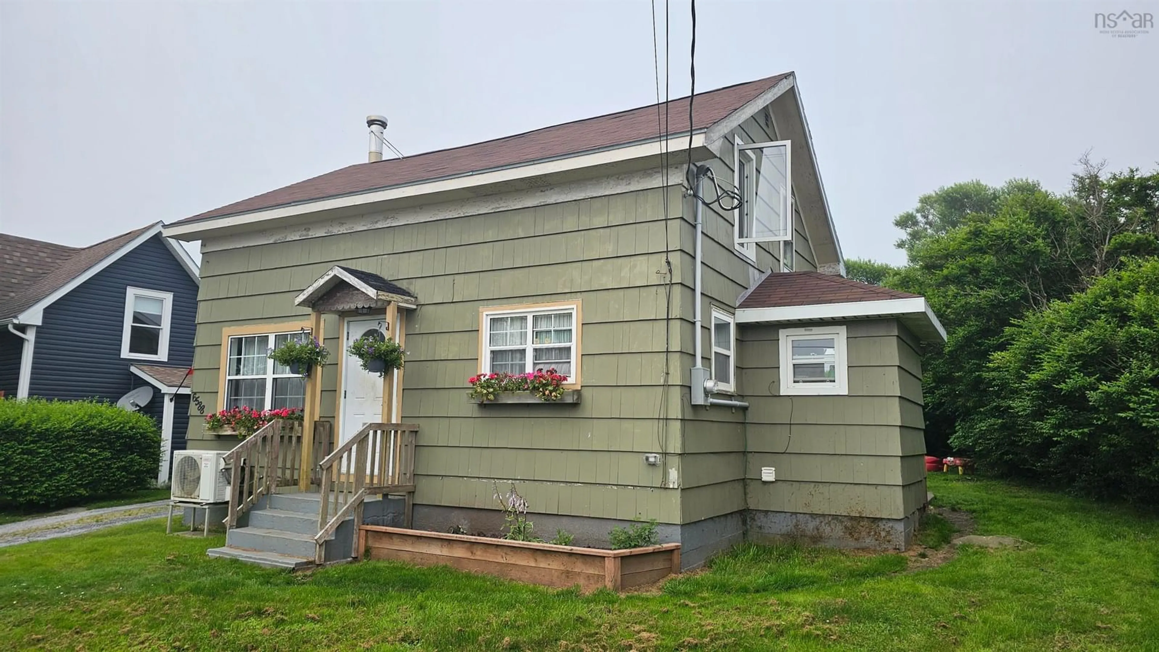 Home with vinyl exterior material, building for 6588 Highway 3, Lower Woods Harbour Nova Scotia B0W 2E0