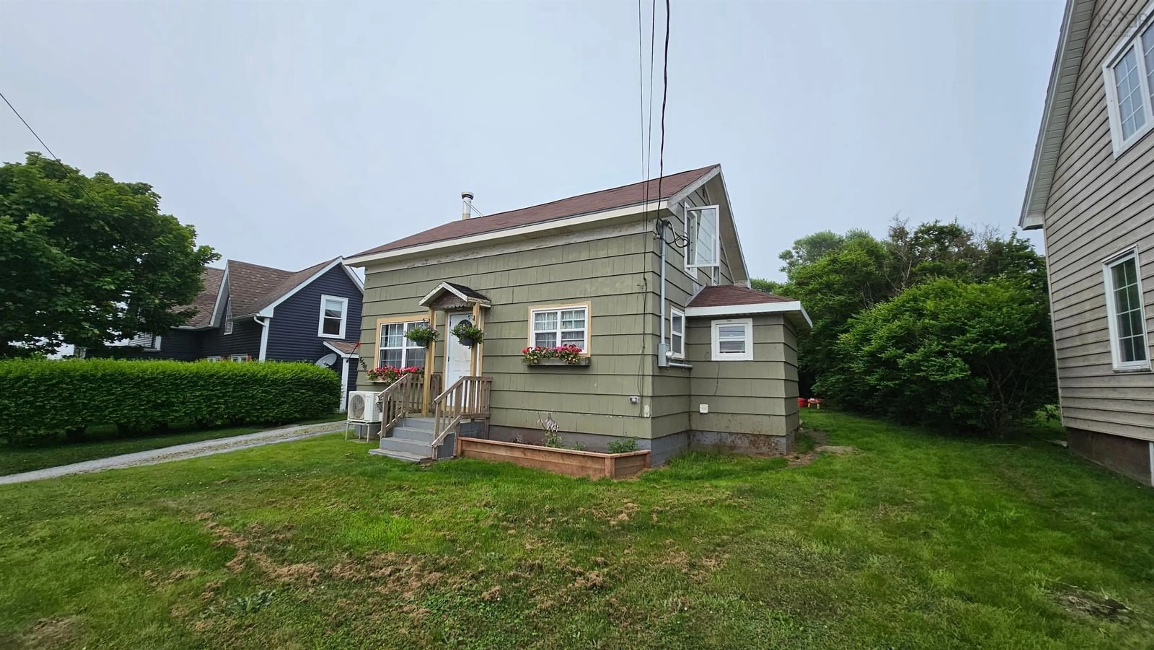 A pic from outside/outdoor area/front of a property/back of a property/a pic from drone, street for 6588 Highway 3, Lower Woods Harbour Nova Scotia B0W 2E0