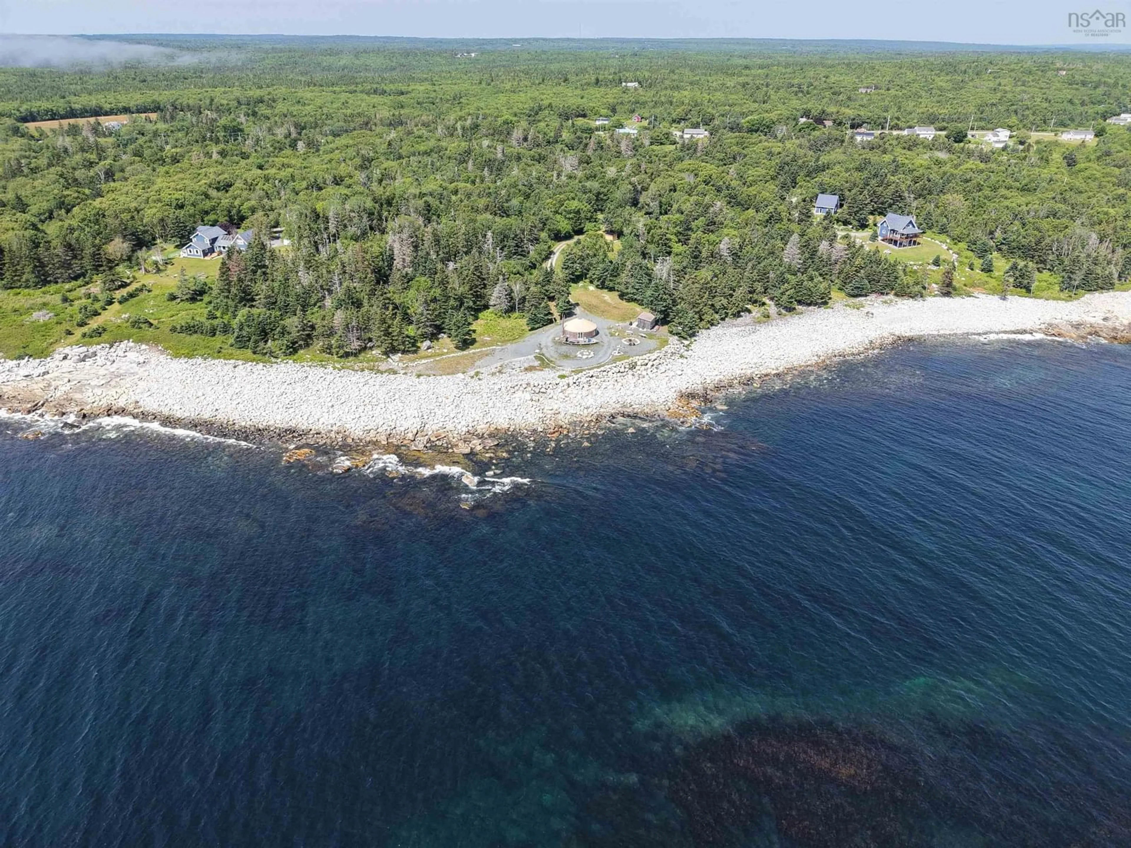 A pic from outside/outdoor area/front of a property/back of a property/a pic from drone, water/lake/river/ocean view for 895 Shore Rd, Moose Harbour Nova Scotia B0T 1K0