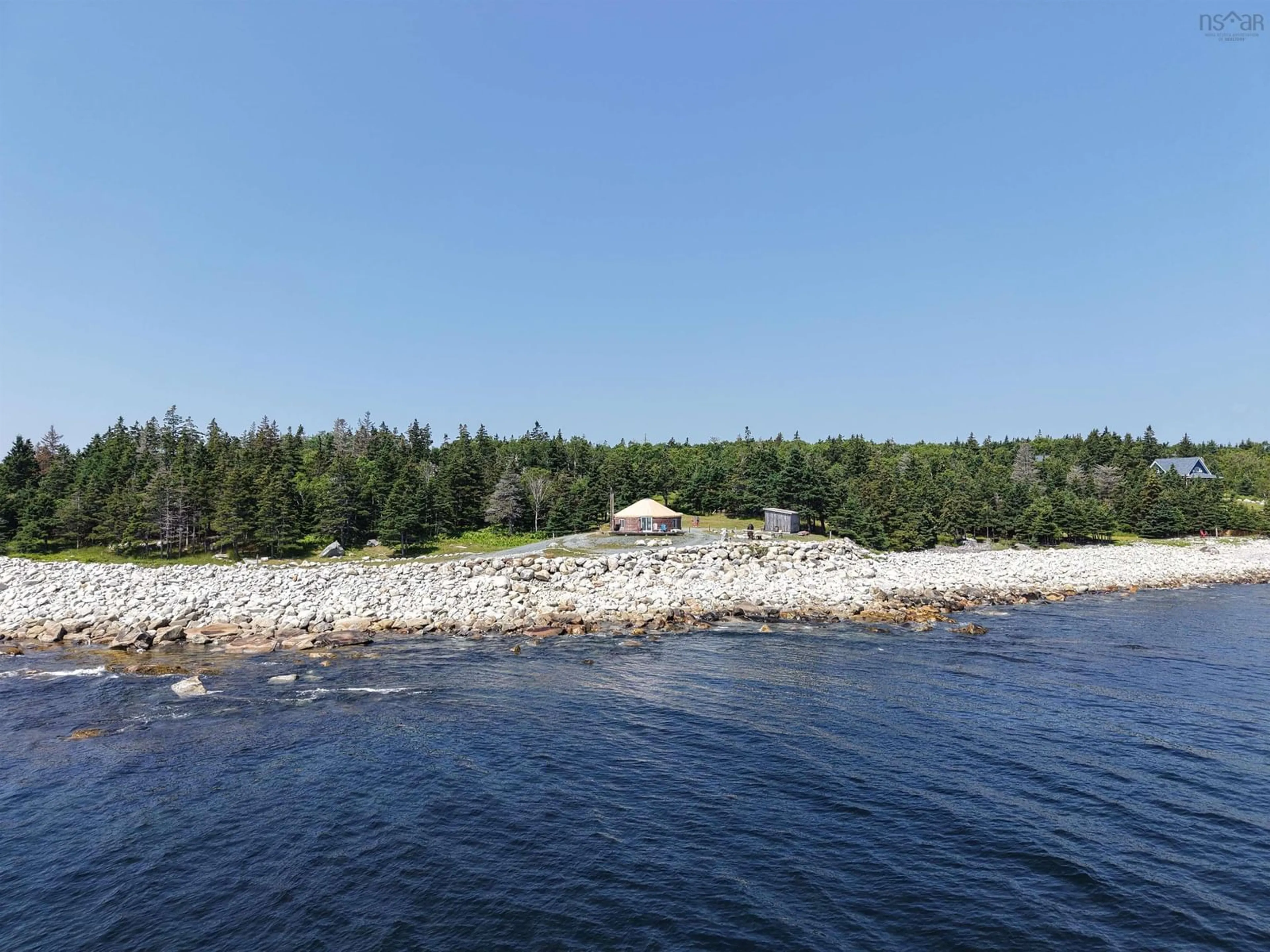 A pic from outside/outdoor area/front of a property/back of a property/a pic from drone, water/lake/river/ocean view for 895 Shore Rd, Moose Harbour Nova Scotia B0T 1K0