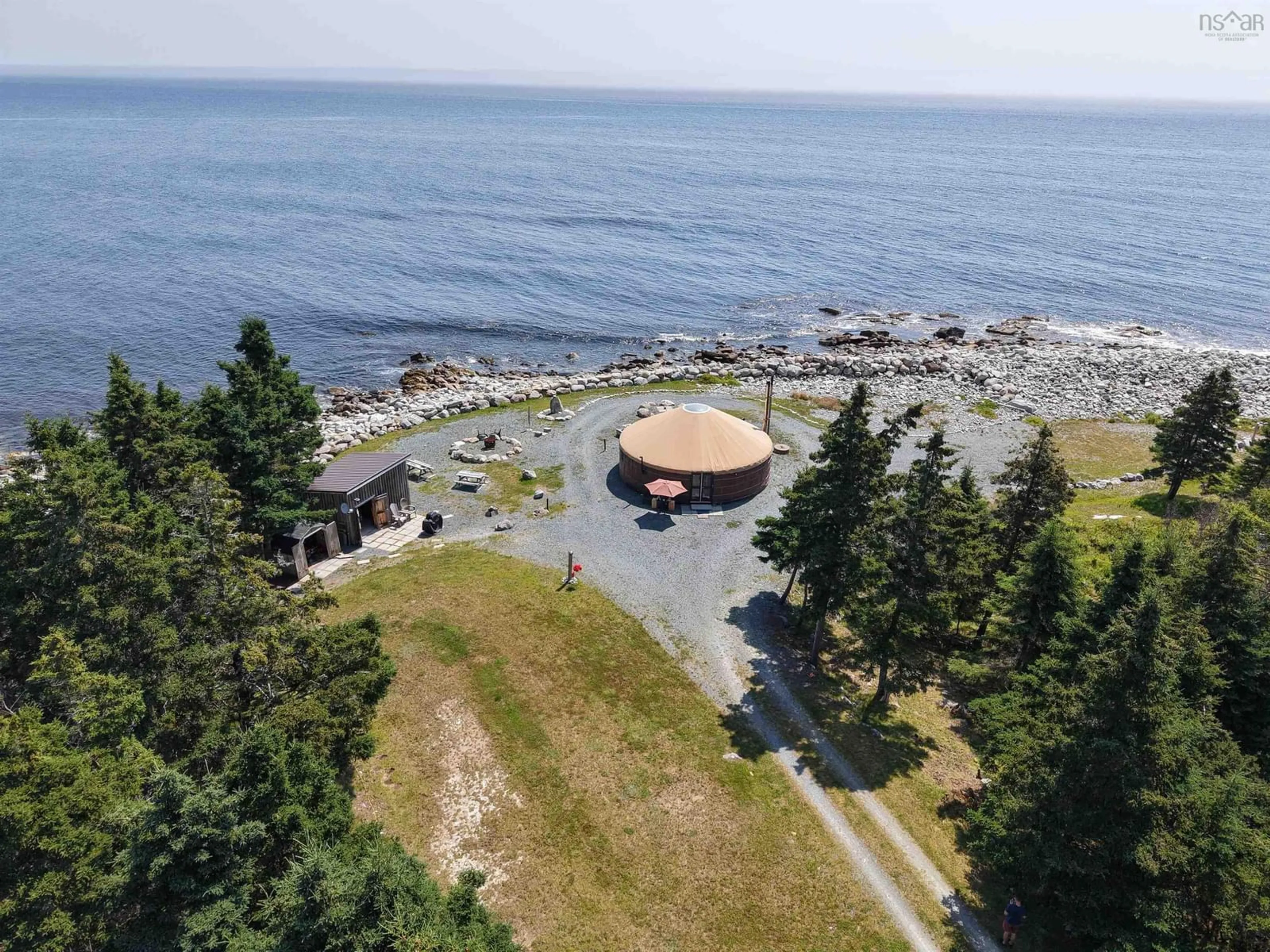 A pic from outside/outdoor area/front of a property/back of a property/a pic from drone, water/lake/river/ocean view for 895 Shore Rd, Moose Harbour Nova Scotia B0T 1K0