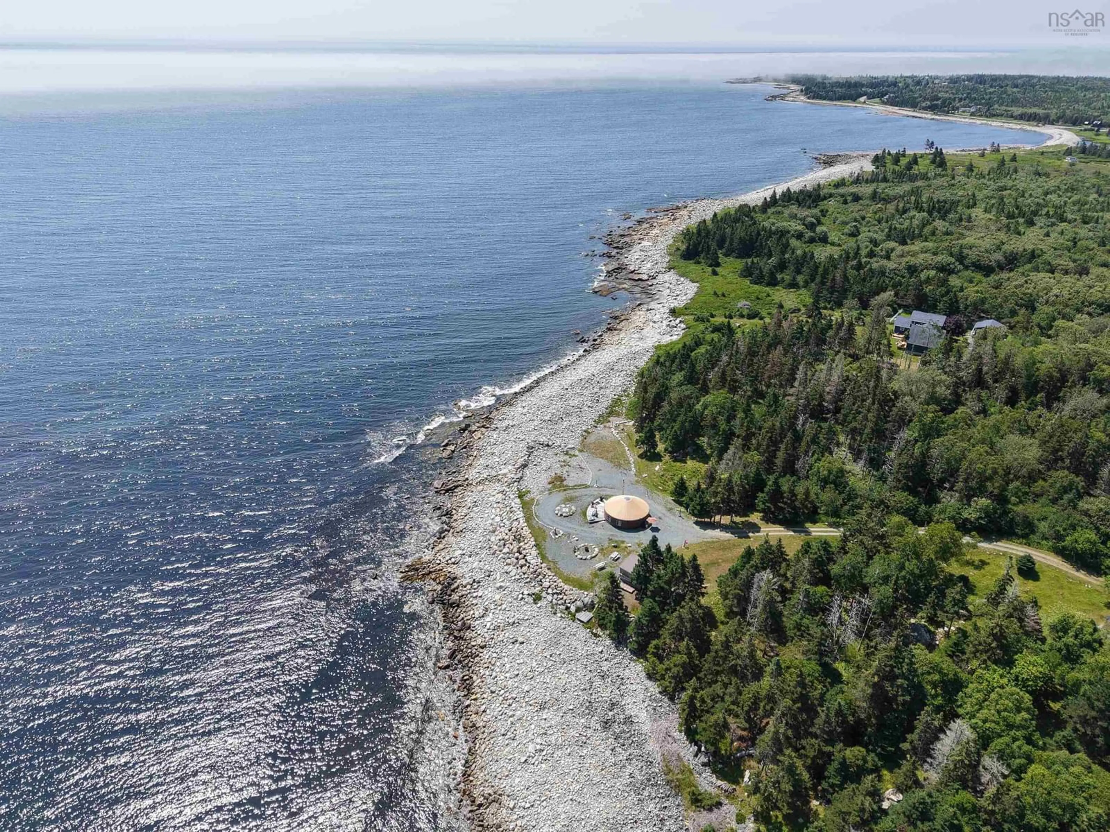 A pic from outside/outdoor area/front of a property/back of a property/a pic from drone, water/lake/river/ocean view for 895 Shore Rd, Moose Harbour Nova Scotia B0T 1K0