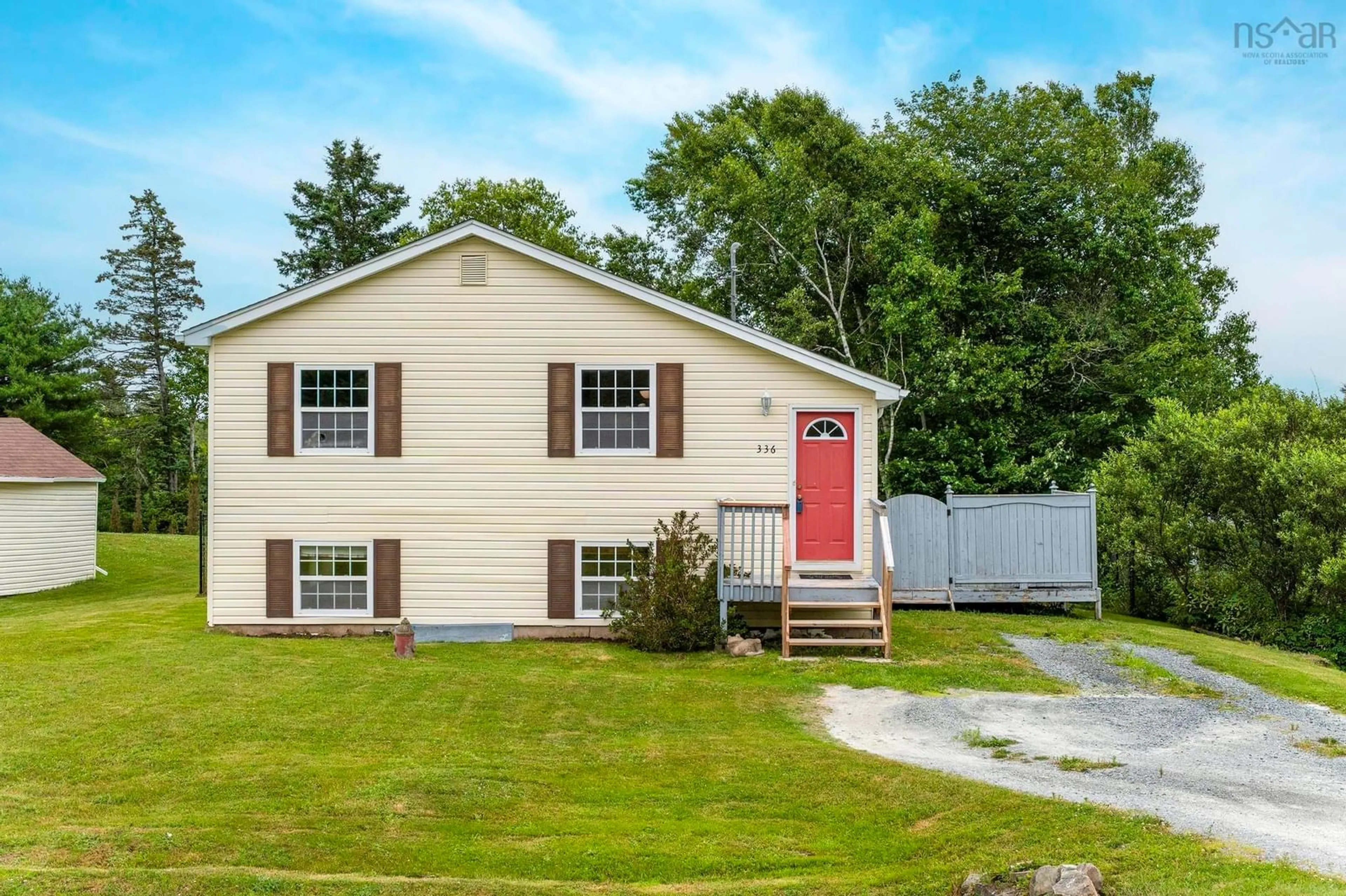 Home with vinyl exterior material, street for 336 West Lawrencetown Rd, Lawrencetown Nova Scotia B2Z 1S4