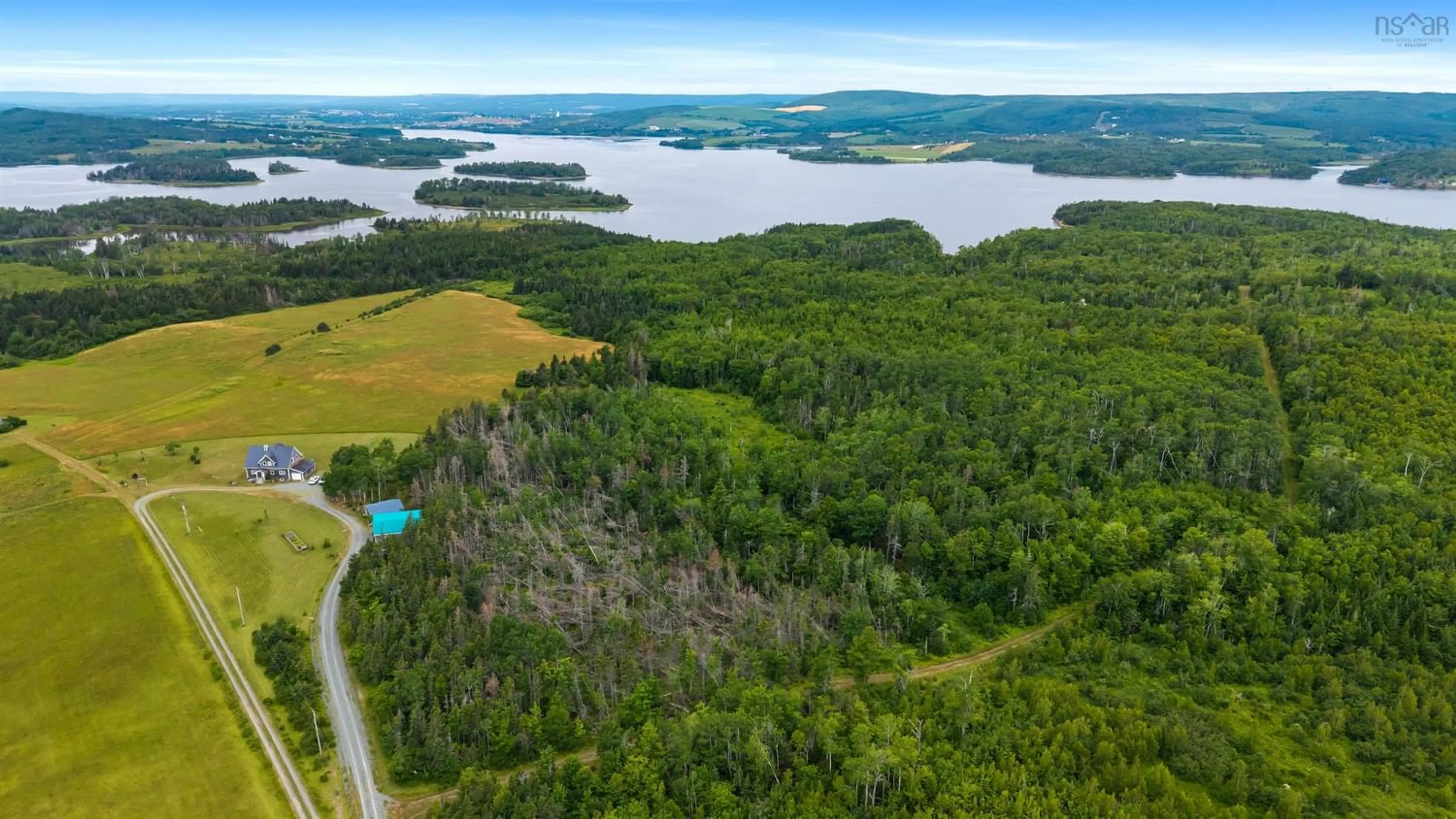 A pic from outside/outdoor area/front of a property/back of a property/a pic from drone, water/lake/river/ocean view for 1159 South Side Harbour Rd, Southside Harbour Nova Scotia B2G 2L4
