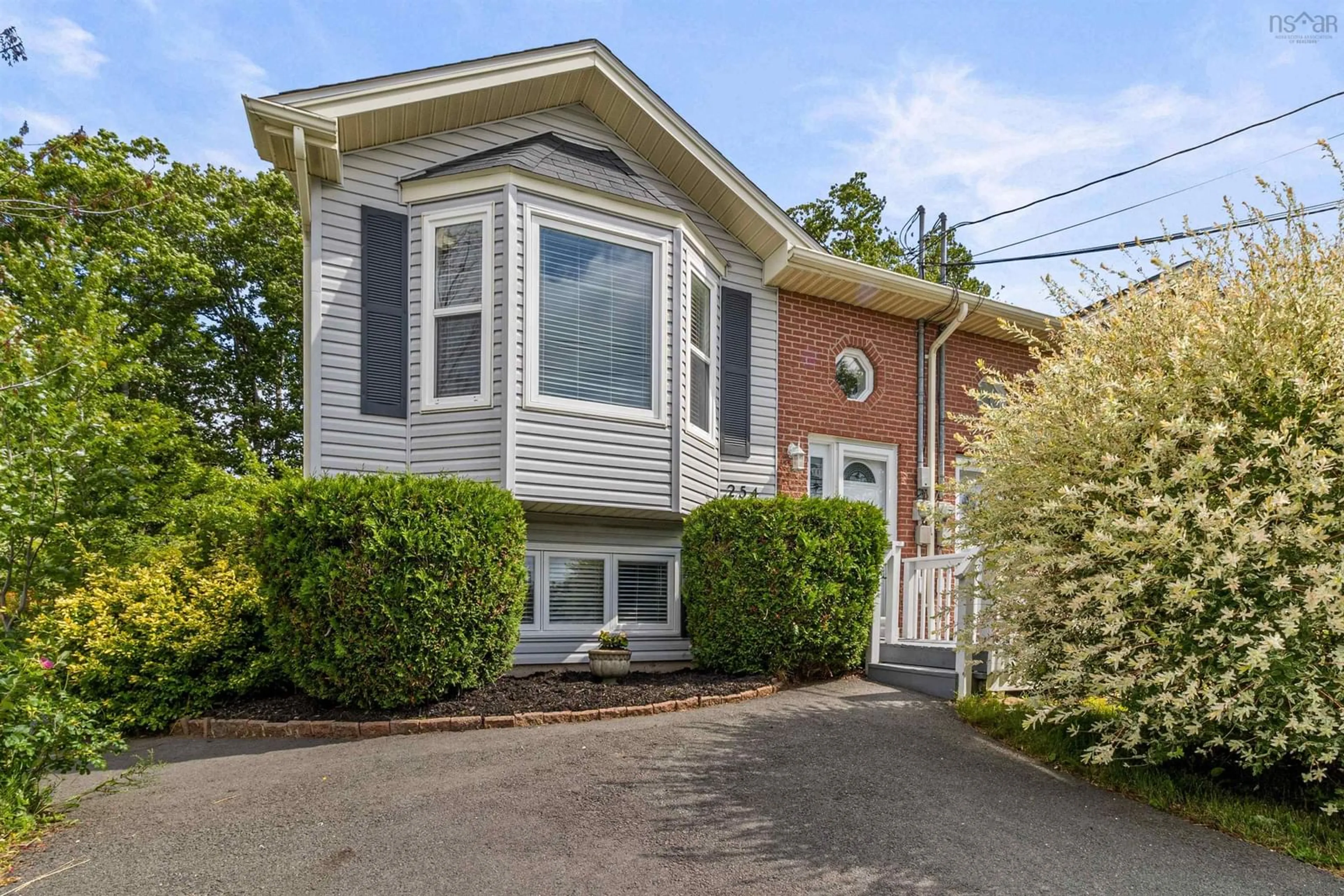 Home with brick exterior material, street for 254 Cobequid Rd, Lower Sackville Nova Scotia B4C 4C5