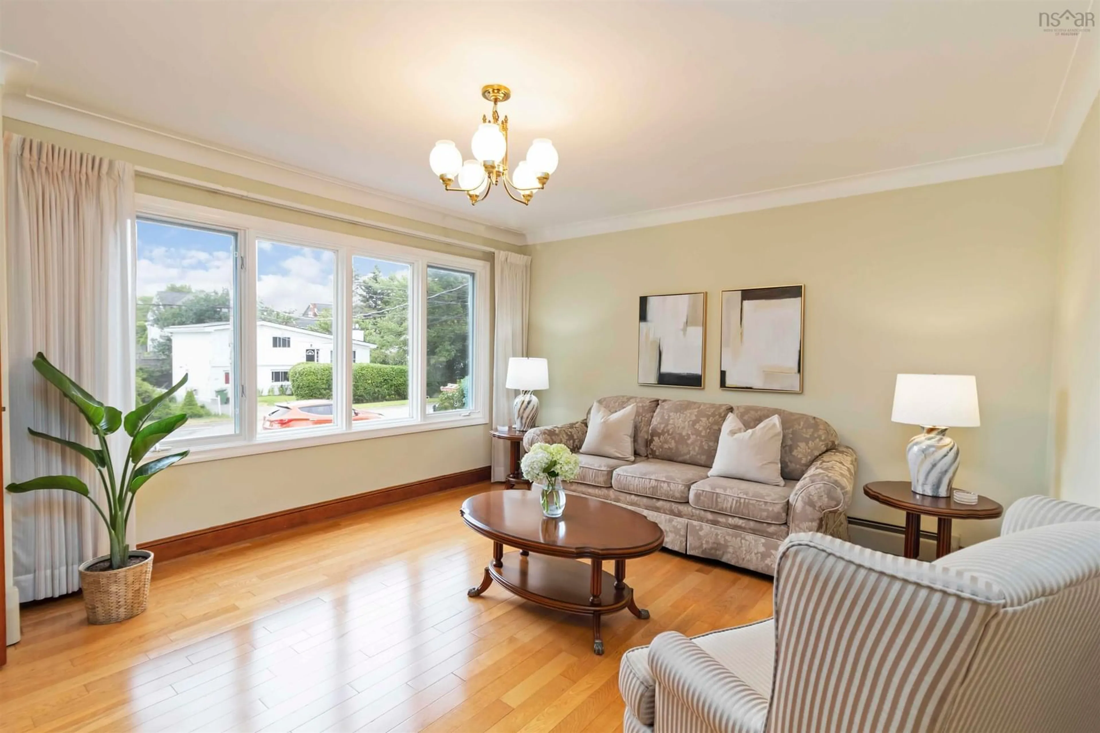 Living room with furniture, wood/laminate floor for 61 Convoy Ave, Halifax Nova Scotia B3N 2P7