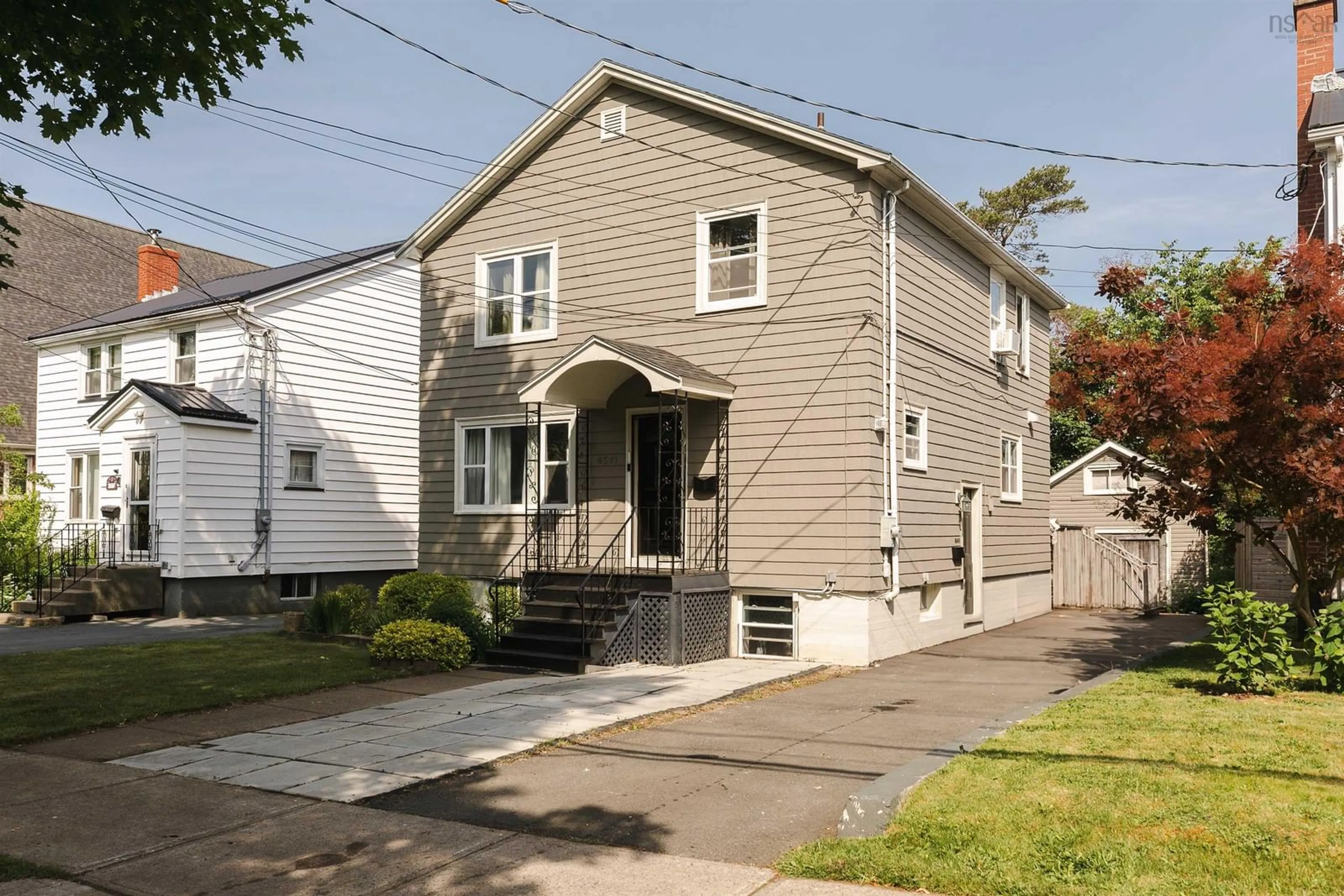 Home with vinyl exterior material, street for 6571 Young St, Halifax Peninsula Nova Scotia B3L 2A5