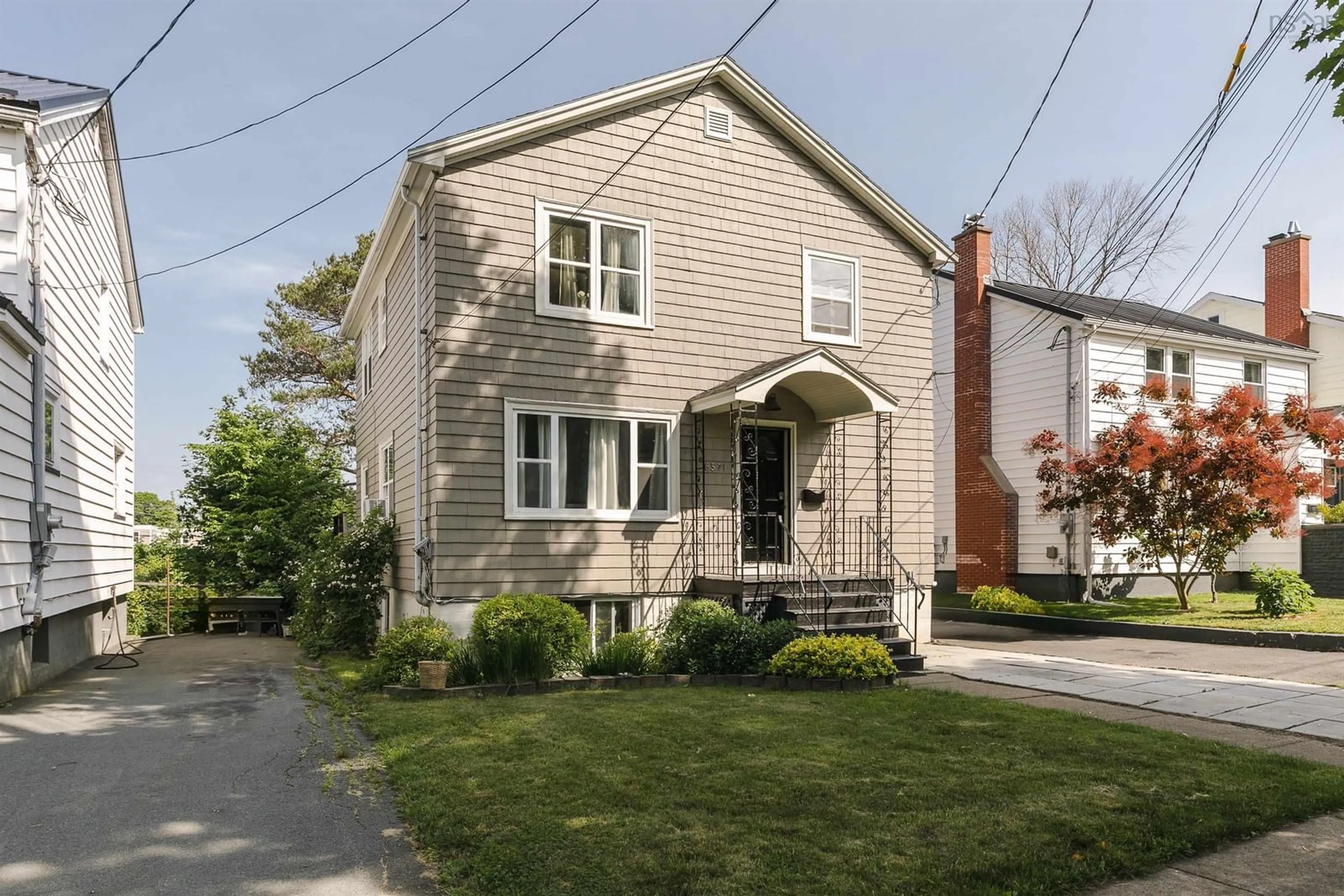 Home with brick exterior material, street for 6571 Young St, Halifax Peninsula Nova Scotia B3L 2A5