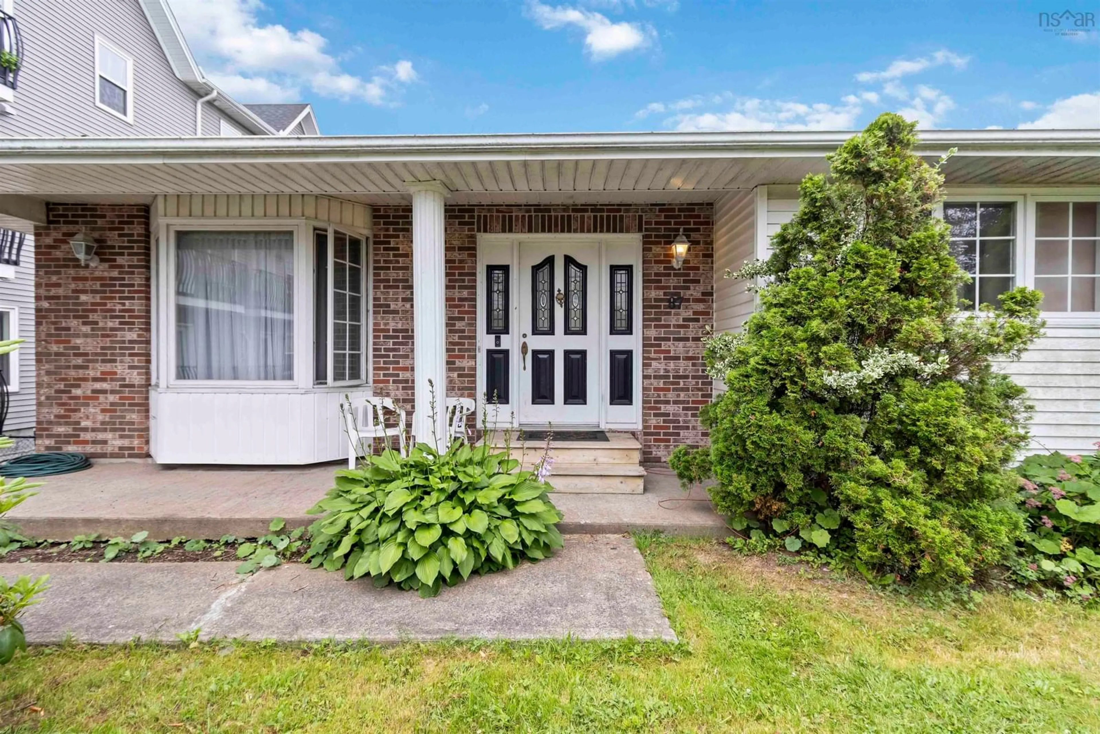 Home with brick exterior material, street for 87 Cow Bay Rd, Eastern Passage Nova Scotia B3G 1A3