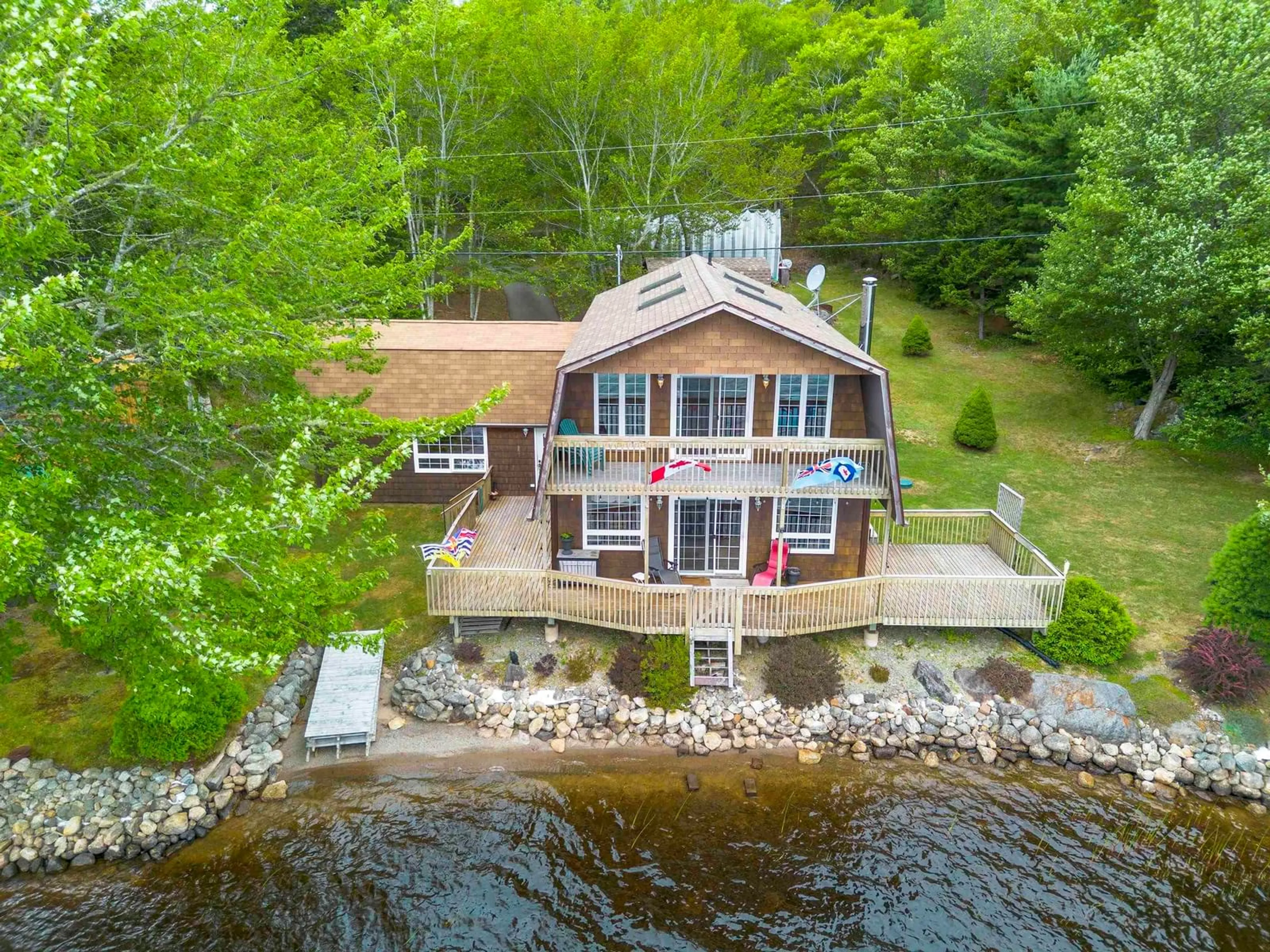 A pic from outside/outdoor area/front of a property/back of a property/a pic from drone, water/lake/river/ocean view for 153 Haines Rd, North Range Nova Scotia B0W 1H0