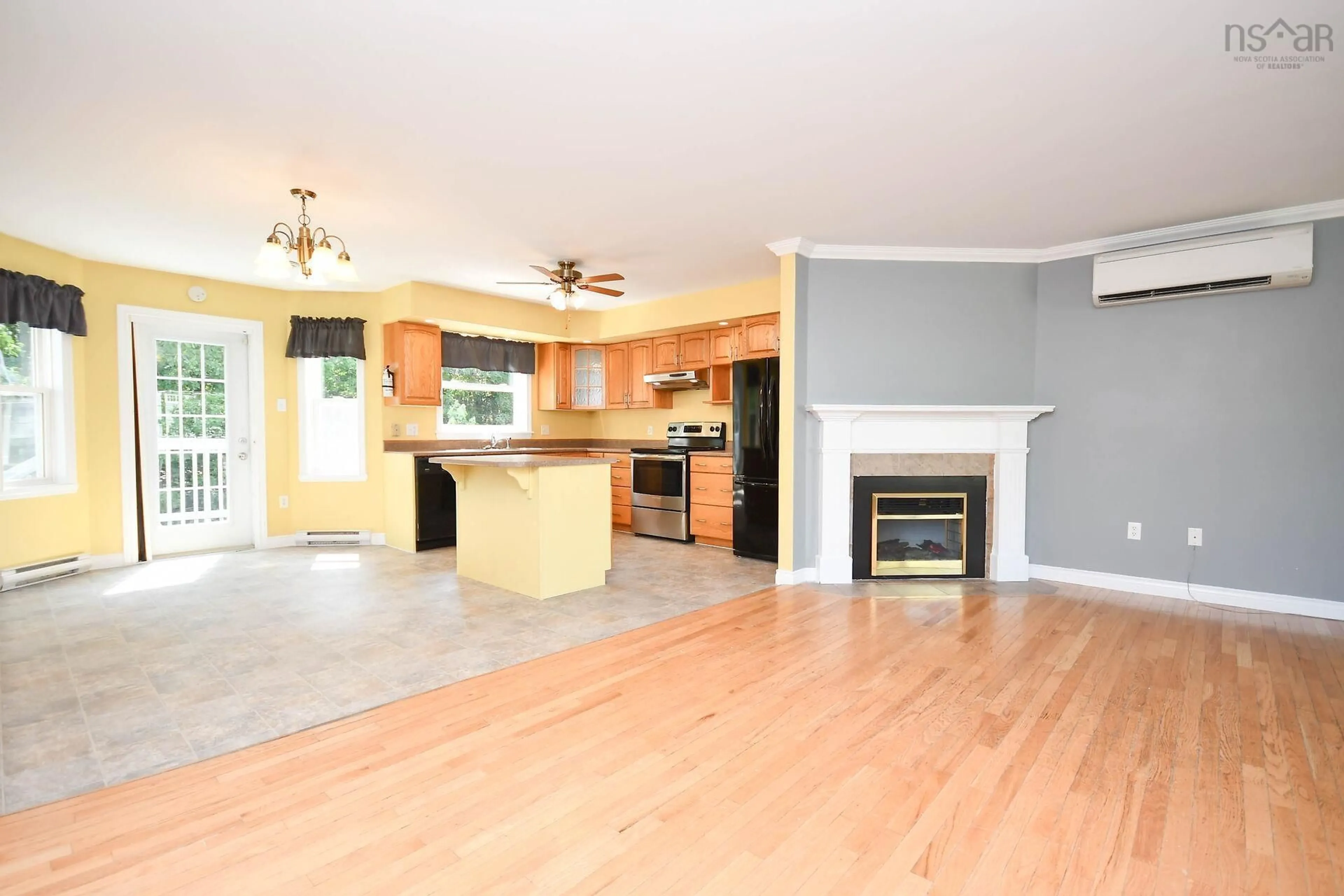 Open concept kitchen, wood/laminate floor for 143 Jackladder Dr #21, Millwood Nova Scotia B4E 0A5
