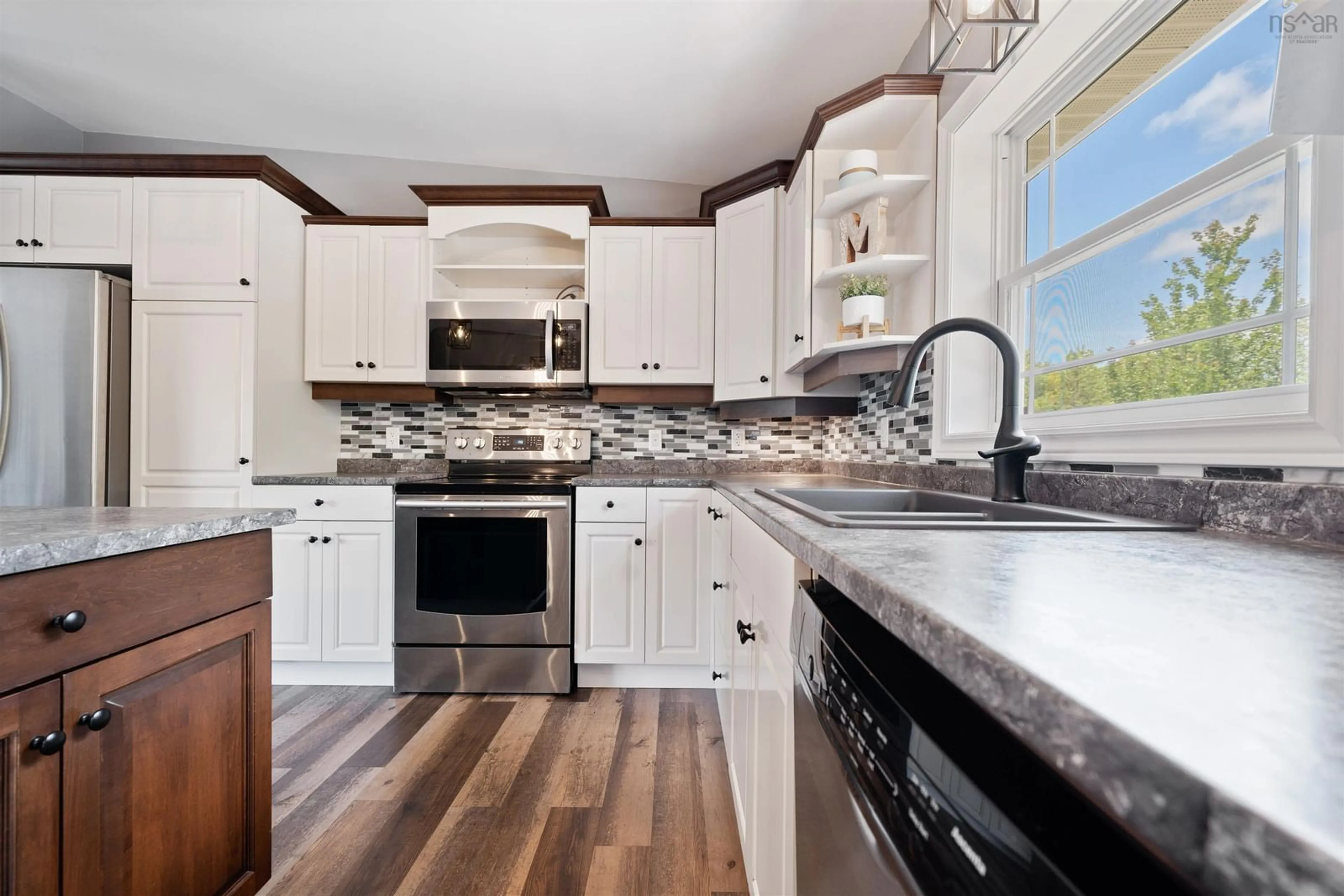 Open concept kitchen, ceramic/tile floor for 8 Maple Cres, Mount William Nova Scotia B2H 5C6