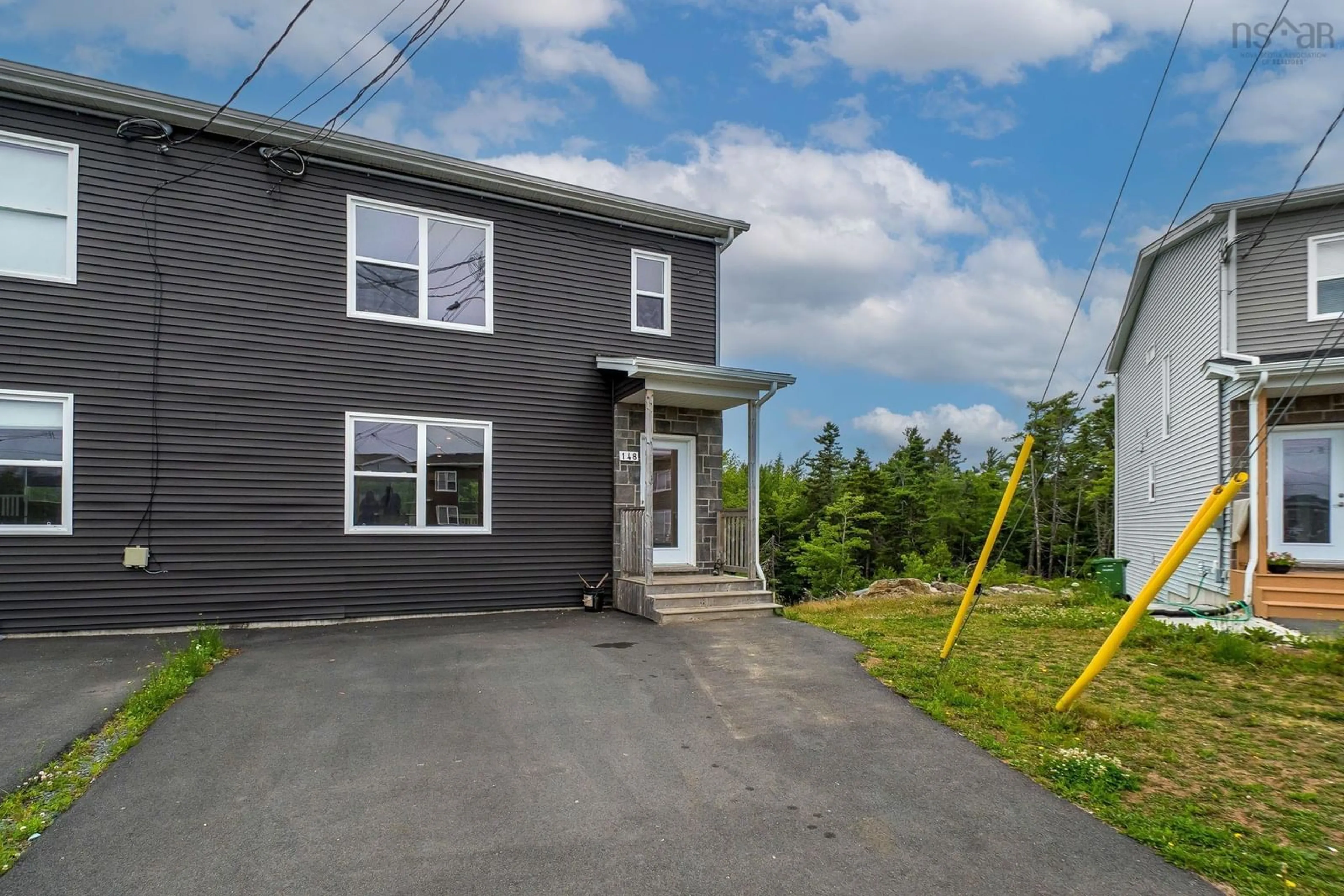 A pic from outside/outdoor area/front of a property/back of a property/a pic from drone, street for 148 Cortland Ridge #140B, Spryfield Nova Scotia B3R 0G7