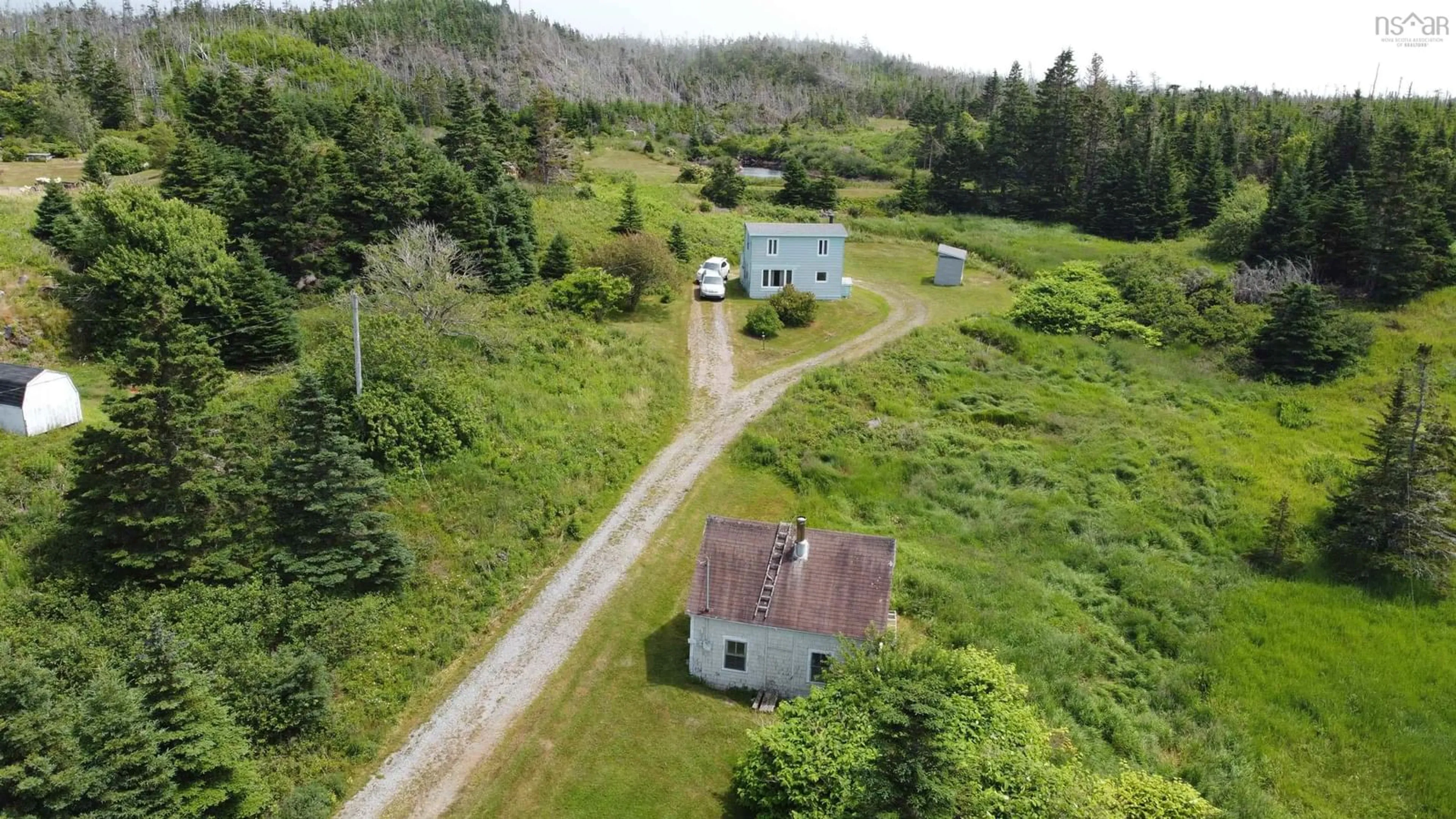A pic from outside/outdoor area/front of a property/back of a property/a pic from drone, street for 169 Havenside Rd, Louisbourg Nova Scotia B1C 1P1