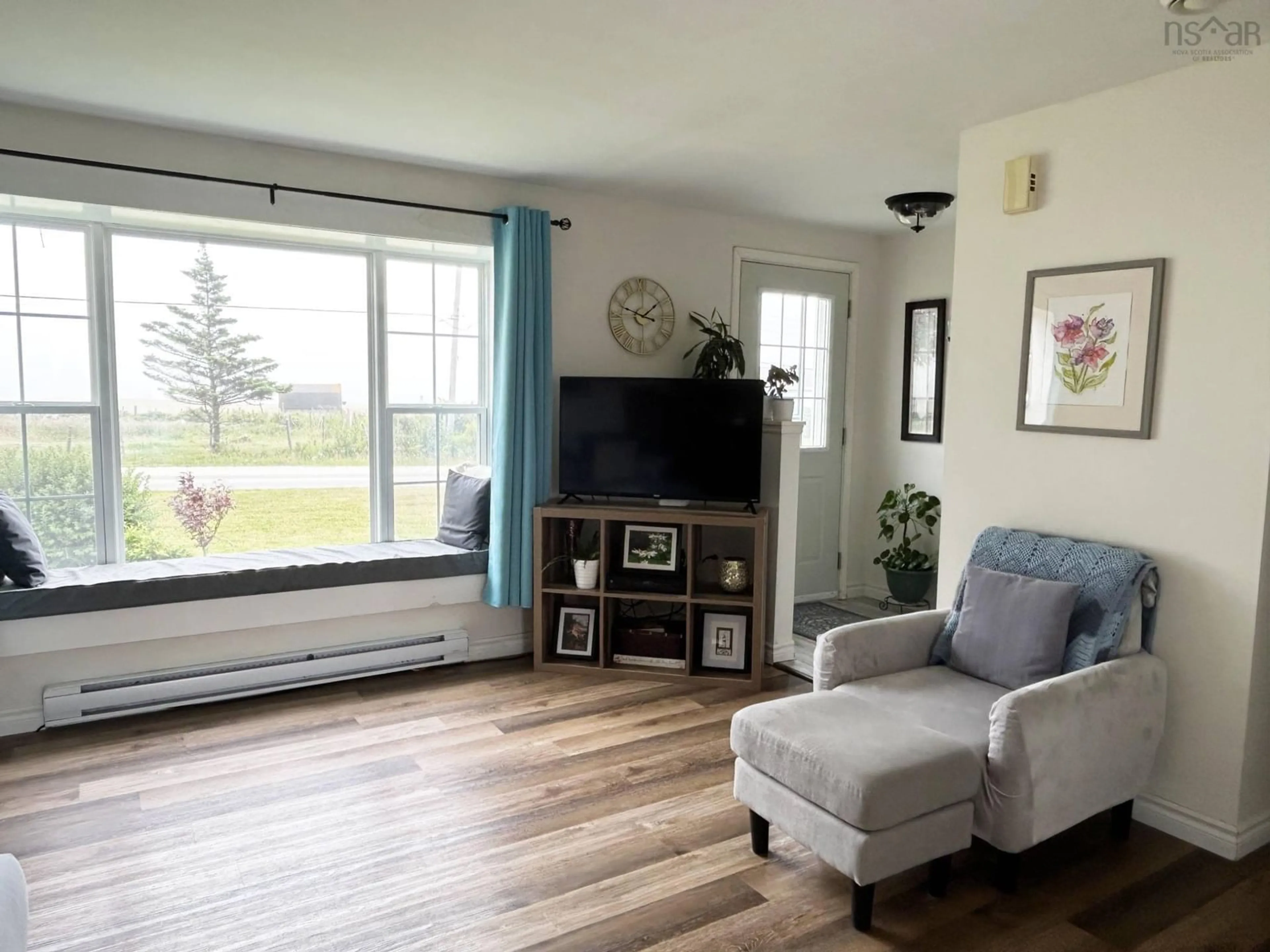 Living room with furniture, unknown for 845 Main Shore Rd, North Chegoggin Nova Scotia B5A 5H2
