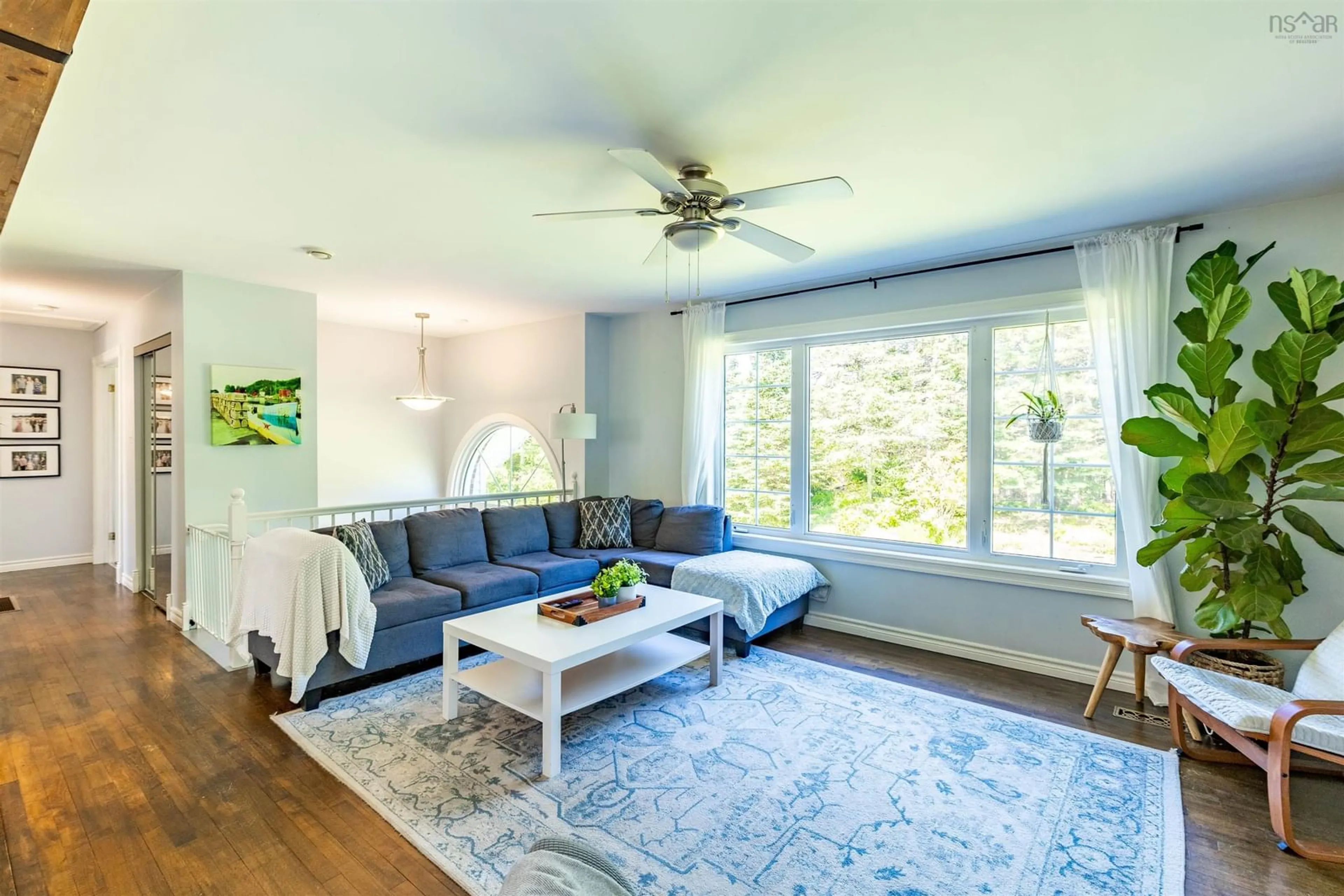 Living room with furniture, wood/laminate floor for 231 Highway 308, Morris Island Nova Scotia B0W 3M0