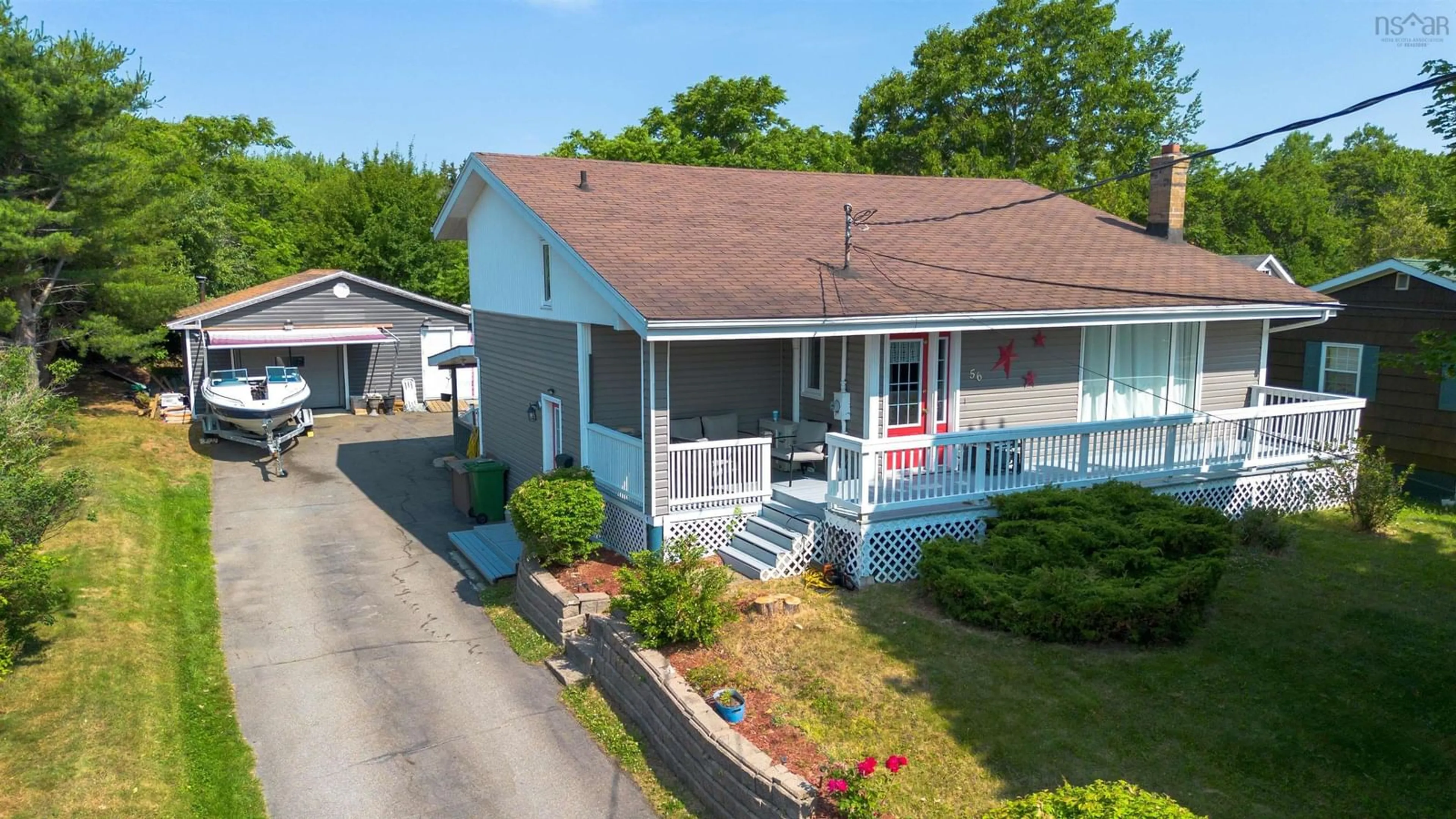 A pic from outside/outdoor area/front of a property/back of a property/a pic from drone, street for 56 Holic Ave, North Sydney Nova Scotia B2A 3R8