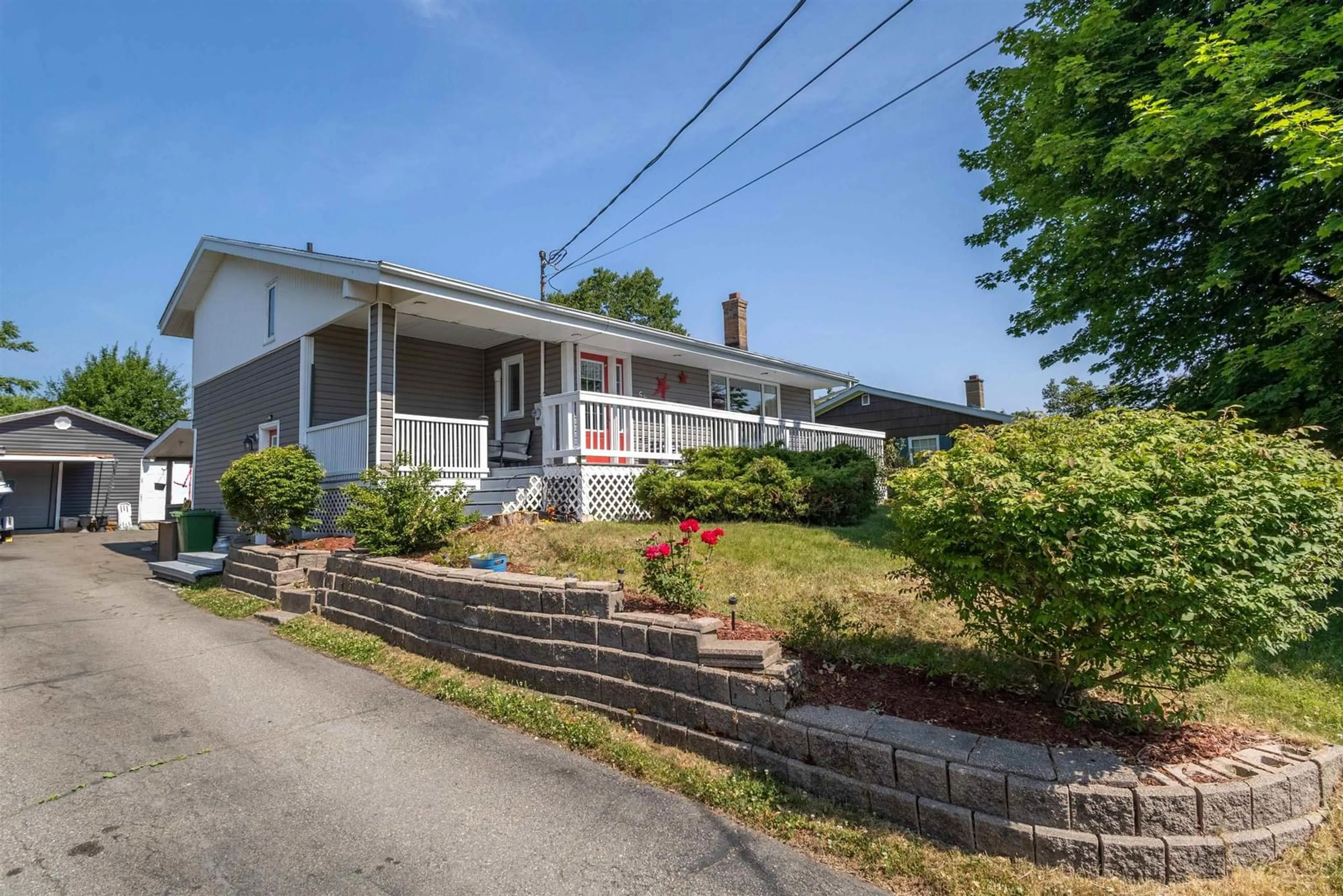 A pic from outside/outdoor area/front of a property/back of a property/a pic from drone, street for 56 Holic Ave, North Sydney Nova Scotia B2A 3R8