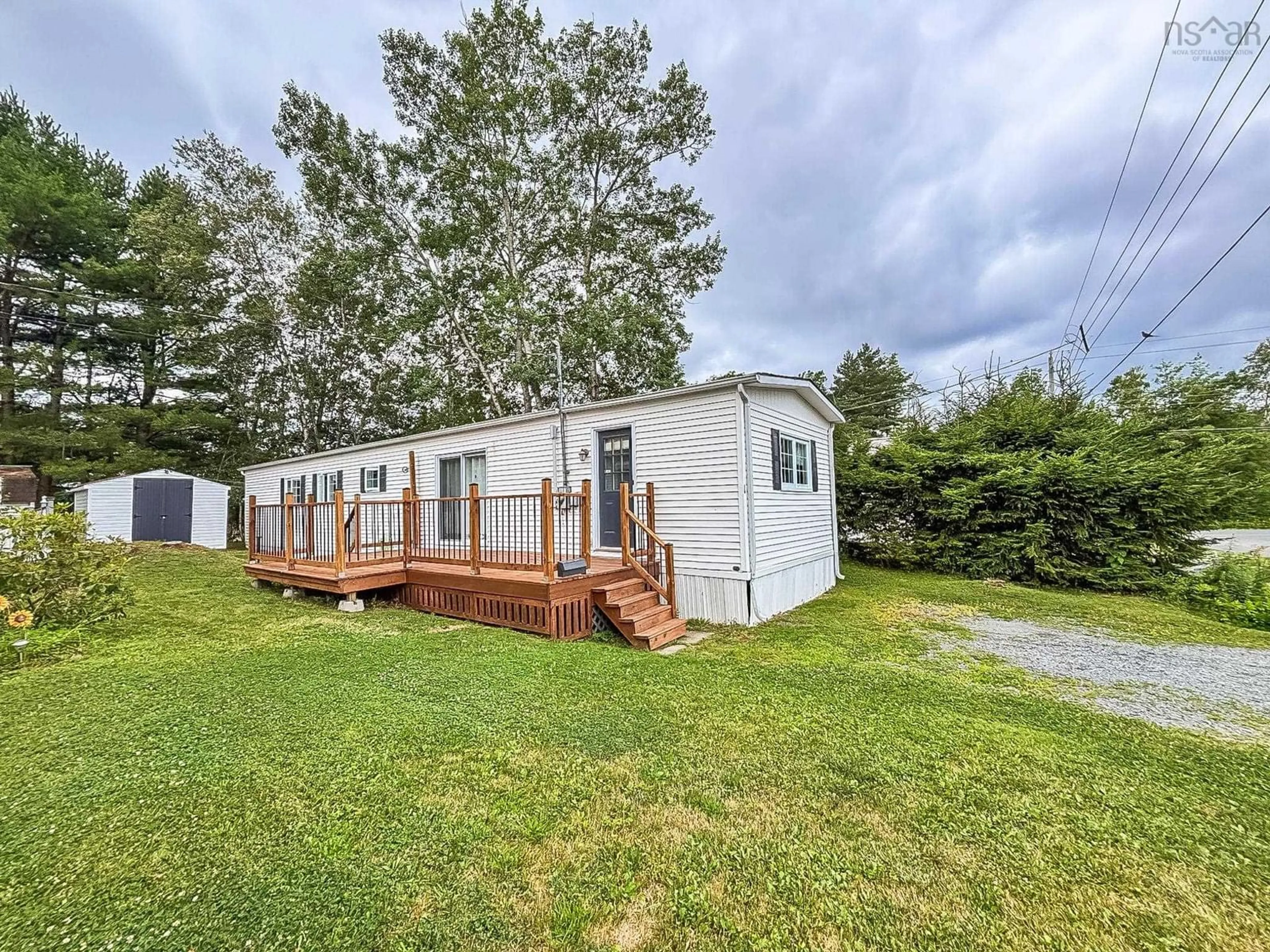 A pic from outside/outdoor area/front of a property/back of a property/a pic from drone, water/lake/river/ocean view for 1 Spring Cres, Bridgewater Nova Scotia B4V 3G3
