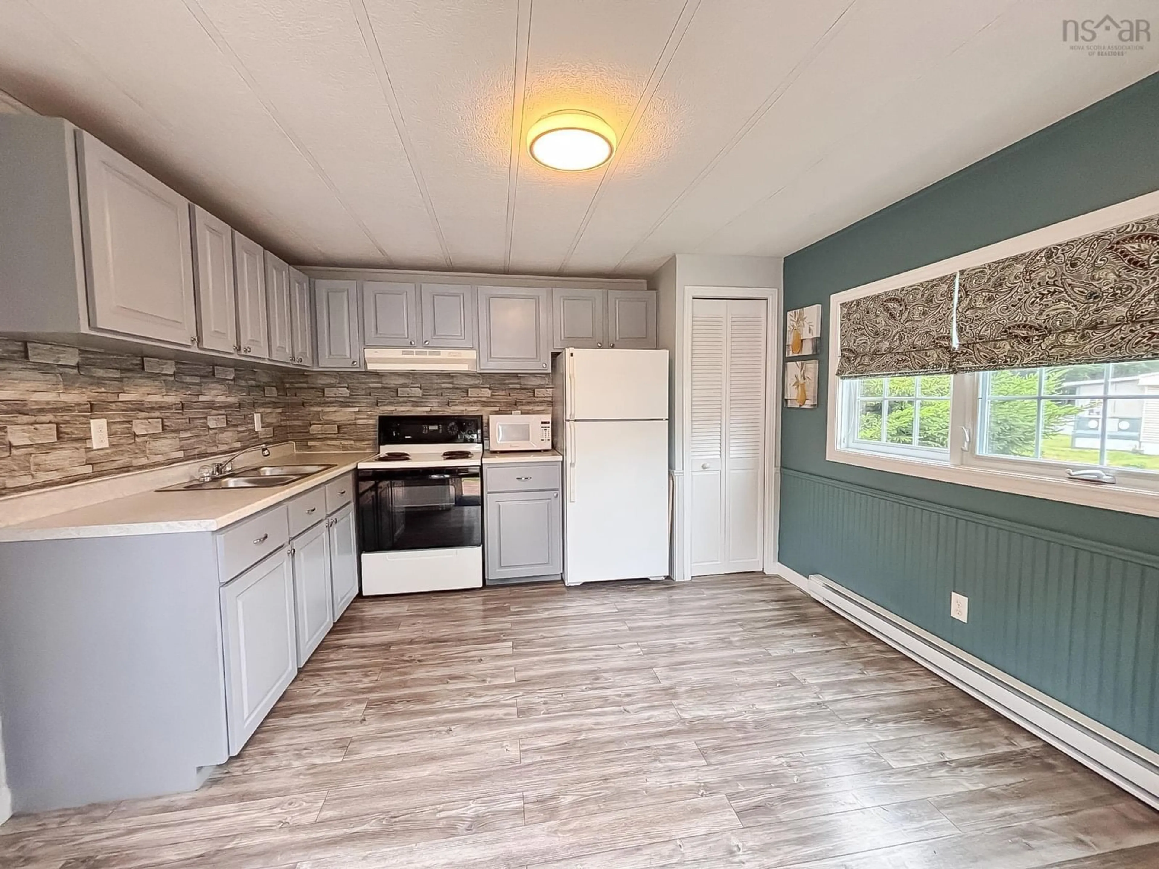 Open concept kitchen, unknown for 1 Spring Cres, Bridgewater Nova Scotia B4V 3G3