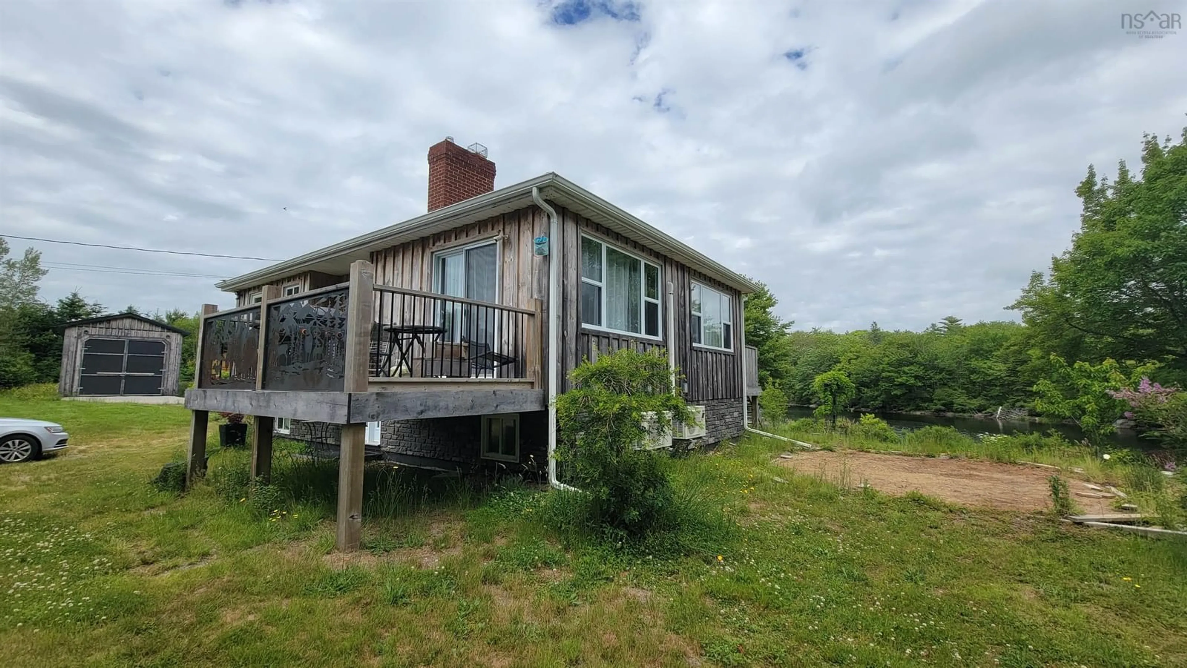 A pic from outside/outdoor area/front of a property/back of a property/a pic from drone, water/lake/river/ocean view for 37 Eli Doucette Rd, Quinan Nova Scotia B0W 3M0