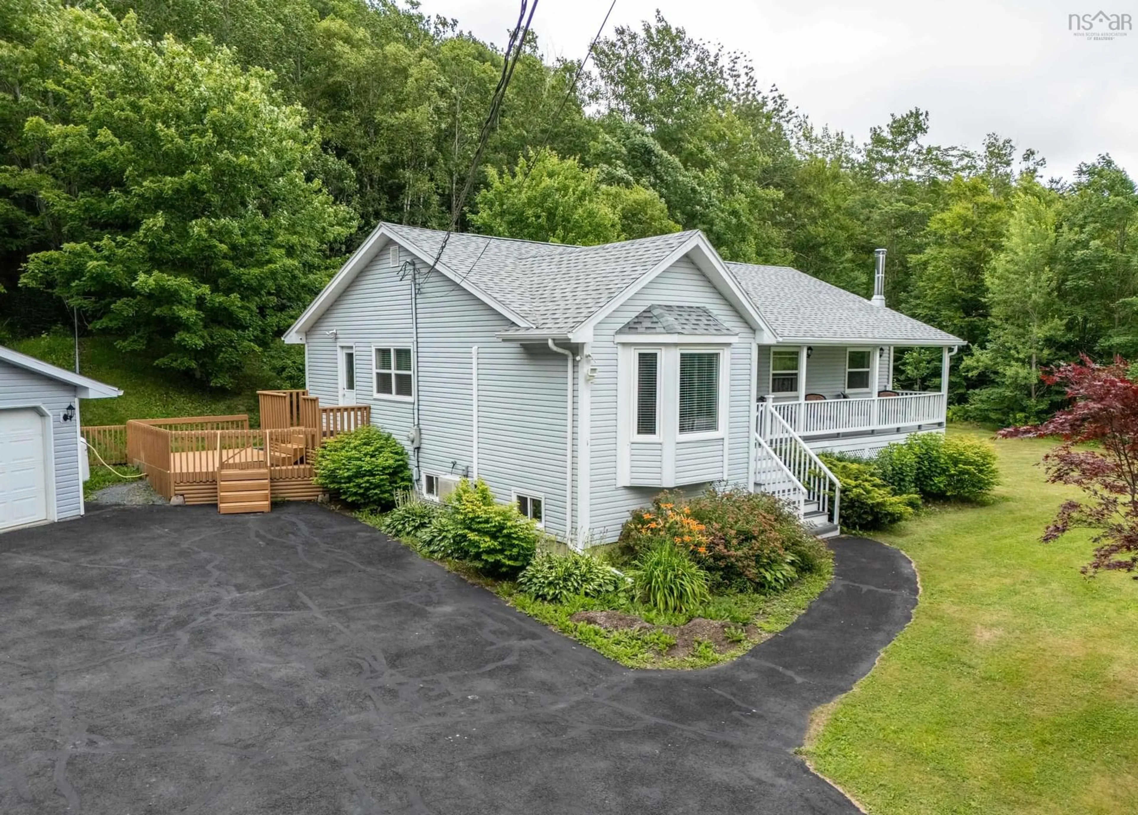 A pic from outside/outdoor area/front of a property/back of a property/a pic from drone, unknown for 18 Rothwell, Upper Sackville Nova Scotia B4E 3C2