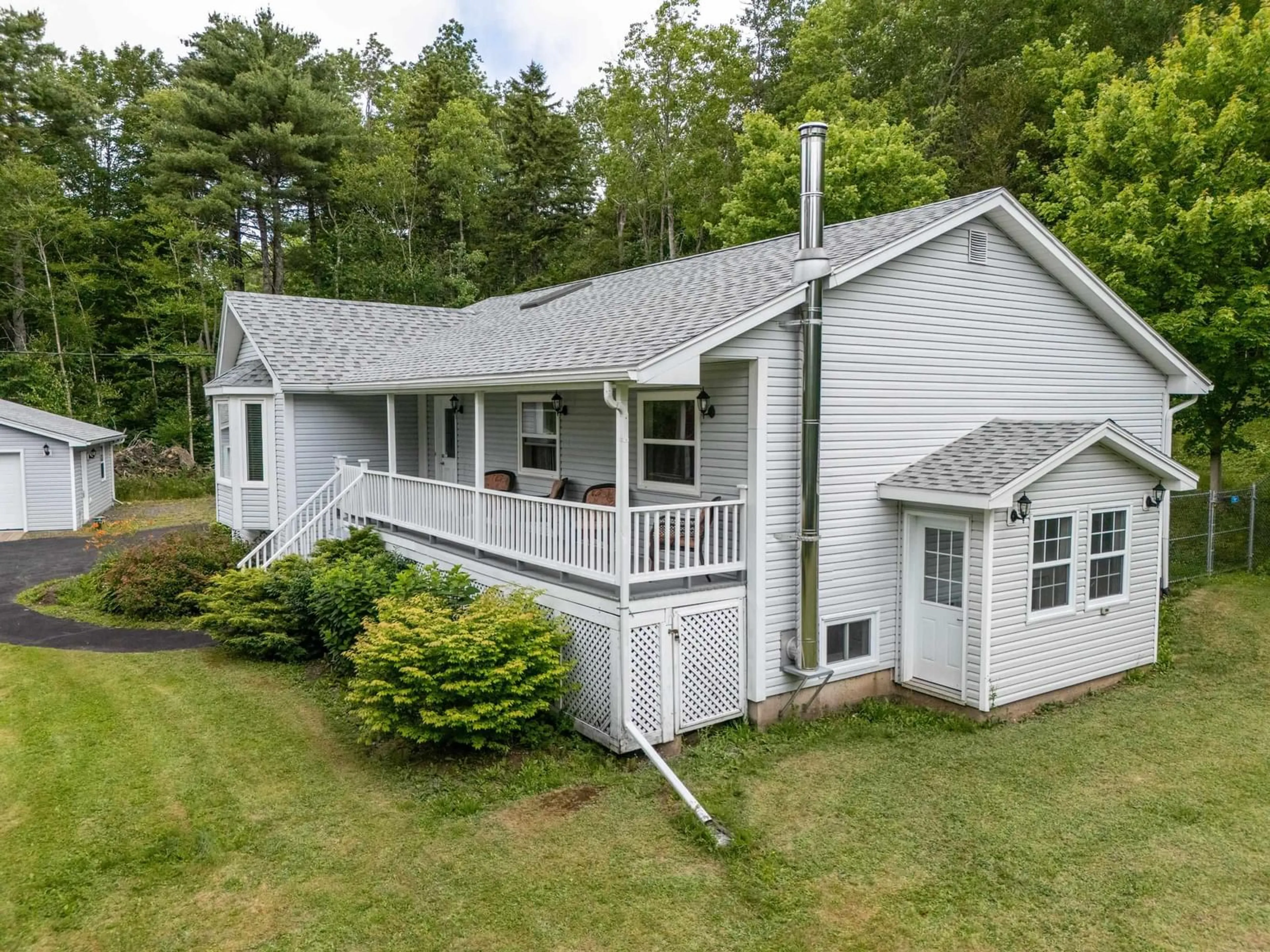 A pic from outside/outdoor area/front of a property/back of a property/a pic from drone, unknown for 18 Rothwell, Upper Sackville Nova Scotia B4E 3C2